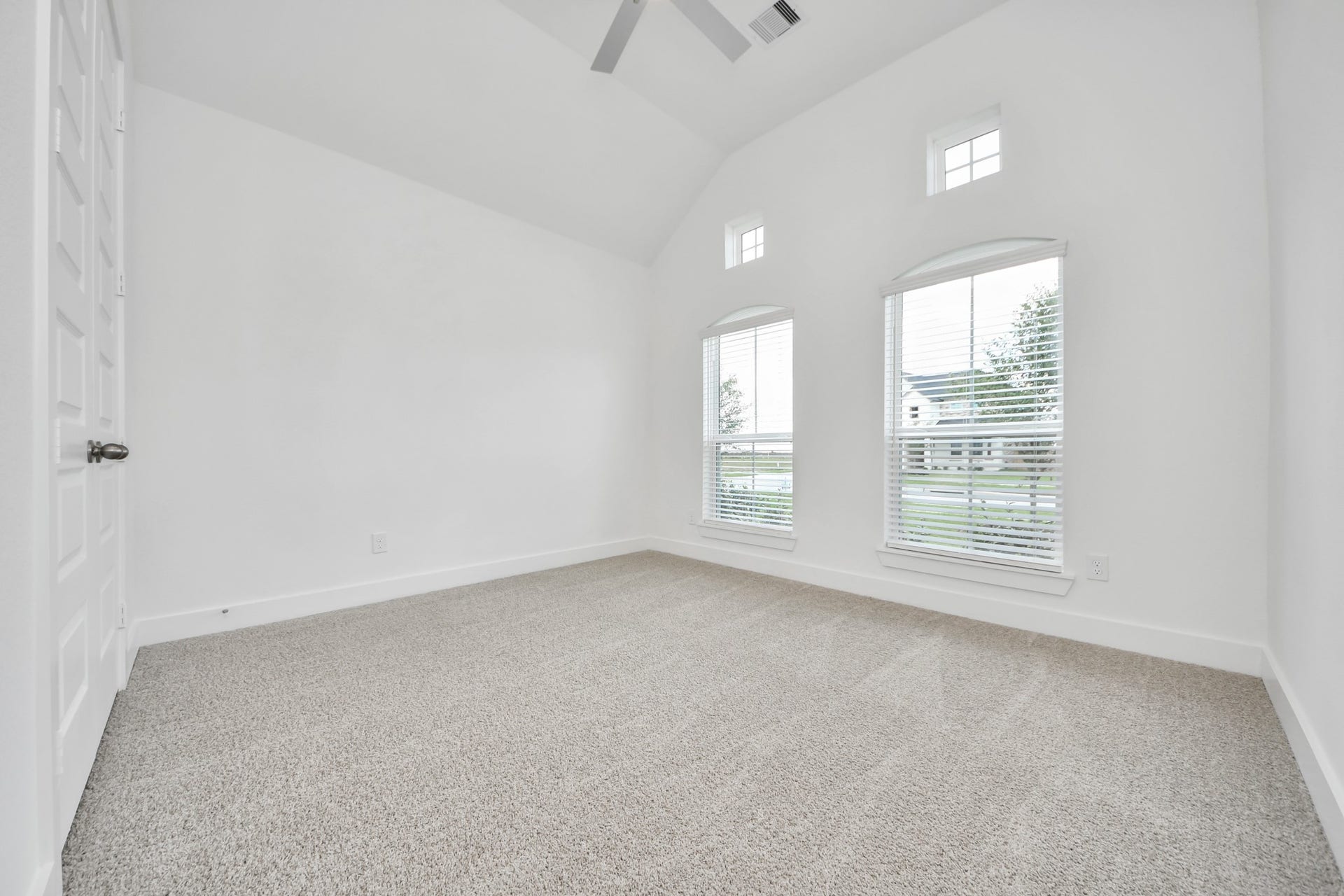 3201 Skerne Spring Drive, Spring, TX 77373 Generously sized secondary bedrooms featuring spacious closets, soft and inviting carpeting underfoot, large windows allowing plenty of natural light, and the added touch of privacy blinds for your personal retreat. Sample photo of completed home with similar floor plan. Actual colors and selections may vary.