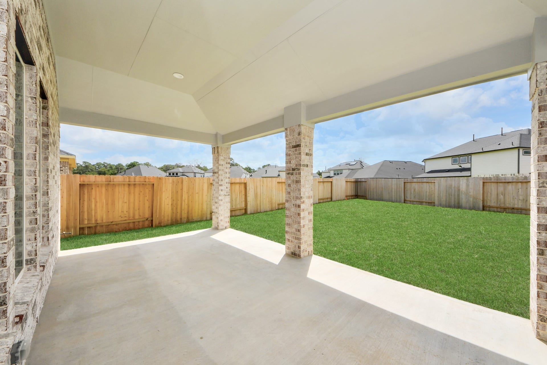 3201 Skerne Spring Drive, Spring, TX 77373 Experience outdoor living at its finest on this expansive covered patio, thoughtfully designed for BBQs and delightful outdoor dining. Sample photo of completed home with similar floor plan. Actual colors and selections may vary.
