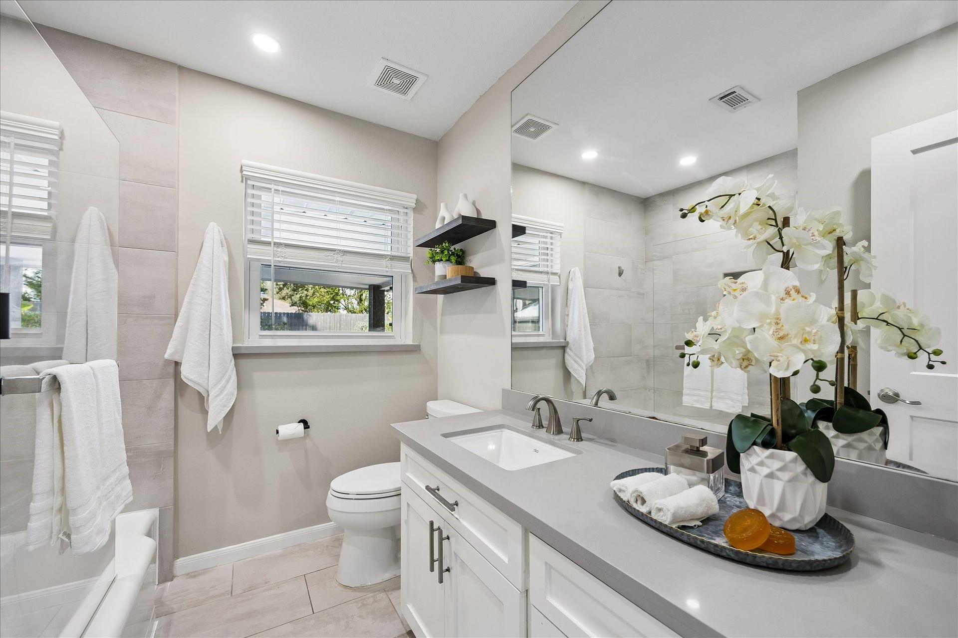 2214 Bron Holly Drive, Houston, TX 77018 Spacious vanity, and polished finishes create a fresh, sophisticated feel.