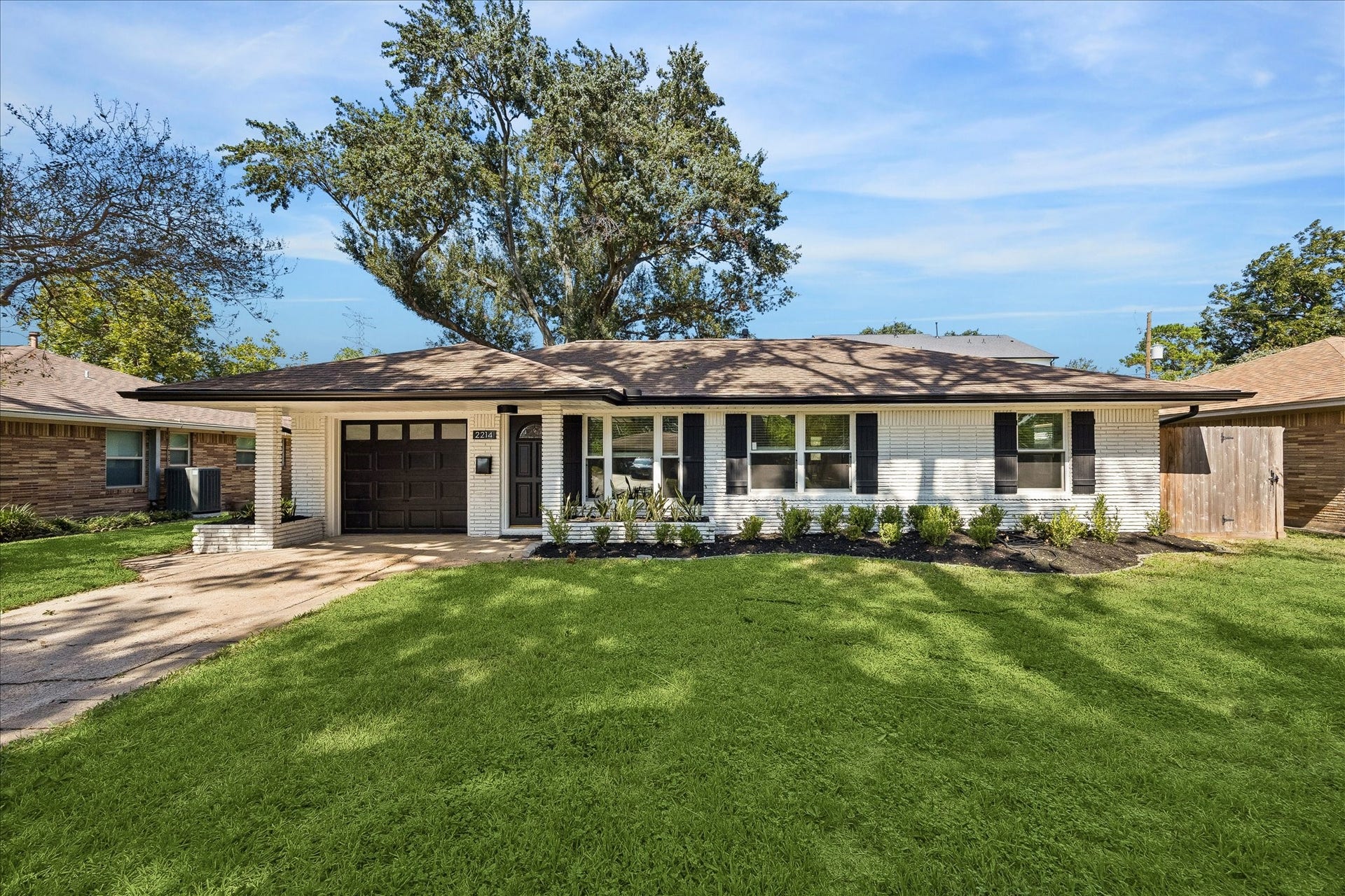 2214 Bron Holly Drive, Houston, TX 77018 Beautifully refreshed and move-in ready, with timeless architecture and inviting curb appeal.