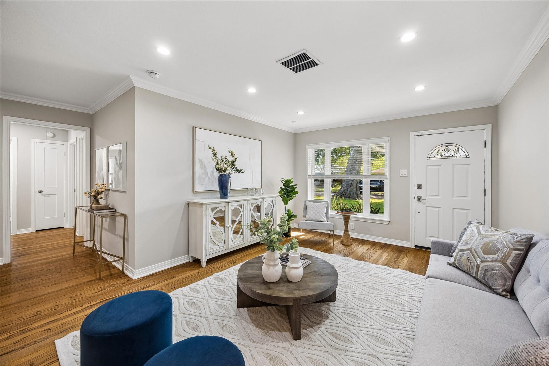 2214 Bron Holly Drive, Houston, TX 77018 A beautiful blend of classic character, modern lighting, and effortless comfort.