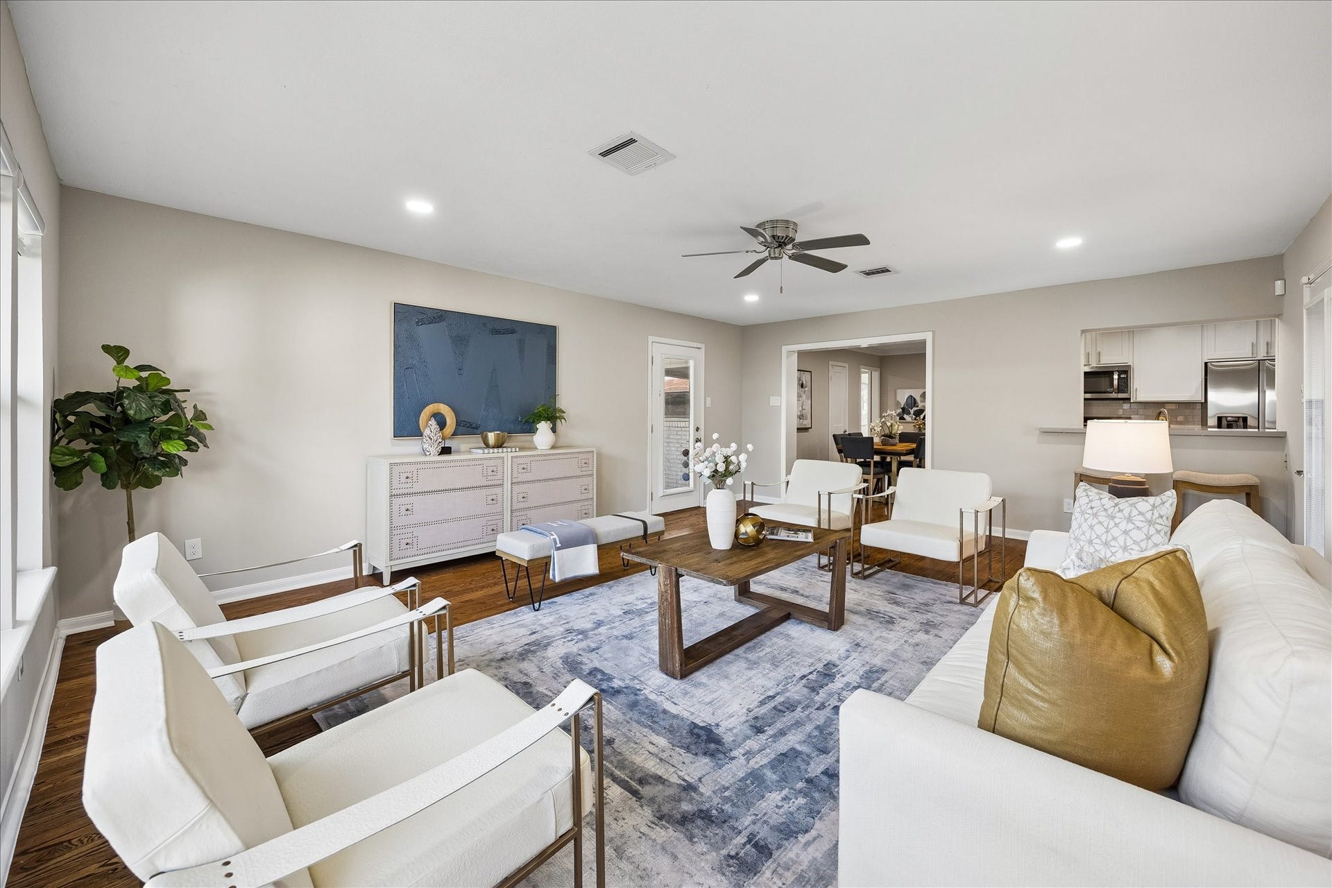 2214 Bron Holly Drive, Houston, TX 77018 Generous proportions, warm hardwood floors, and seamless flow make this room the heart of the home.