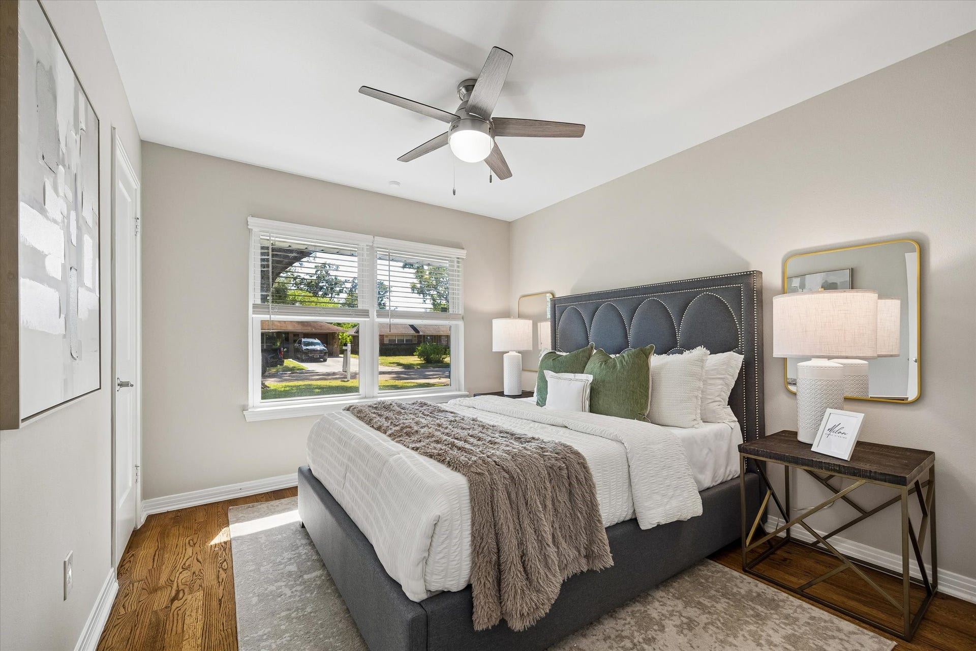 2214 Bron Holly Drive, Houston, TX 77018 A peaceful primary retreat featuring beautiful hardwood floors and abundant natural light.