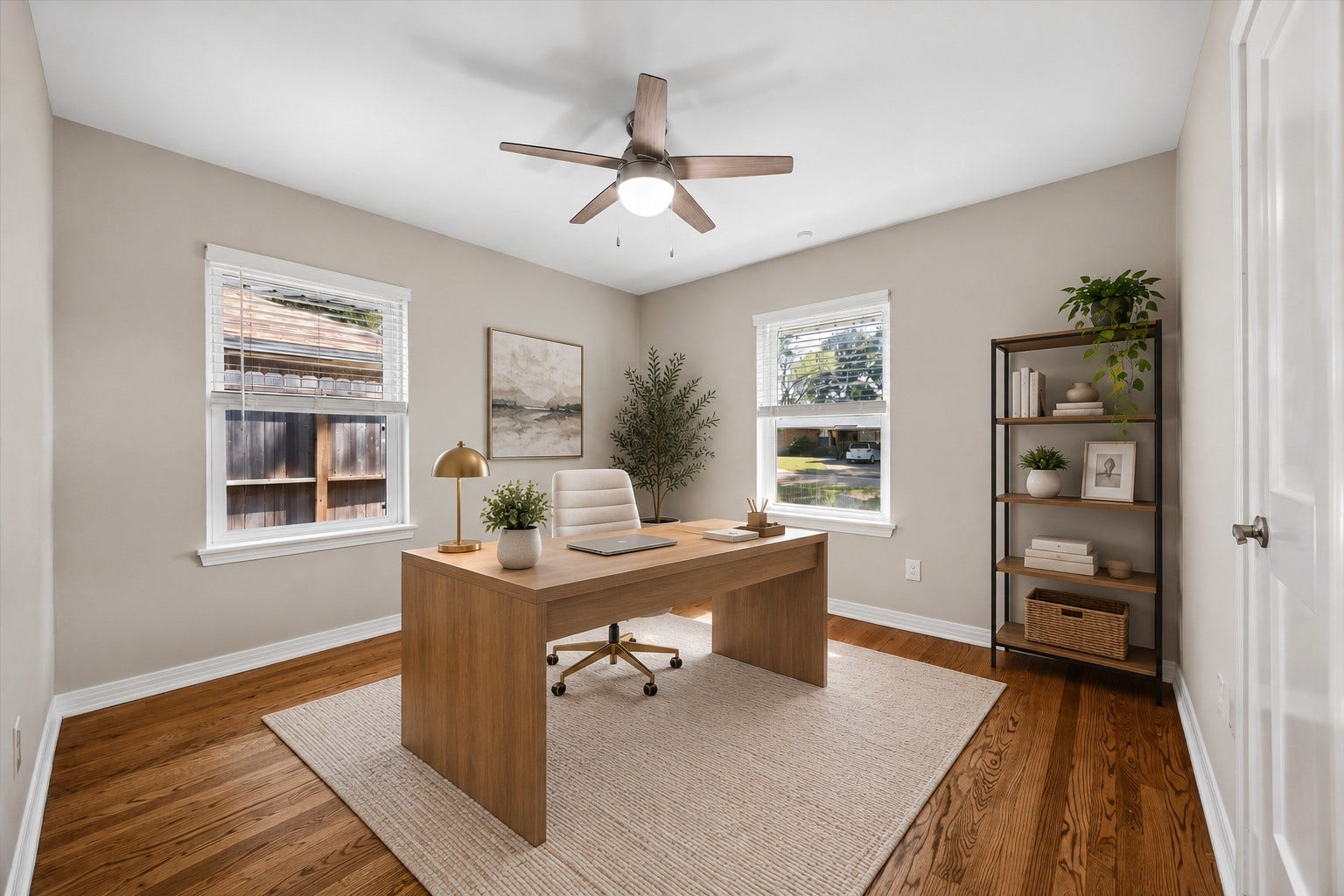 2214 Bron Holly Drive, Houston, TX 77018 A bright, versatile bedroom thoughtfully envisioned as a stylish home office. This photo has been virtually staged.