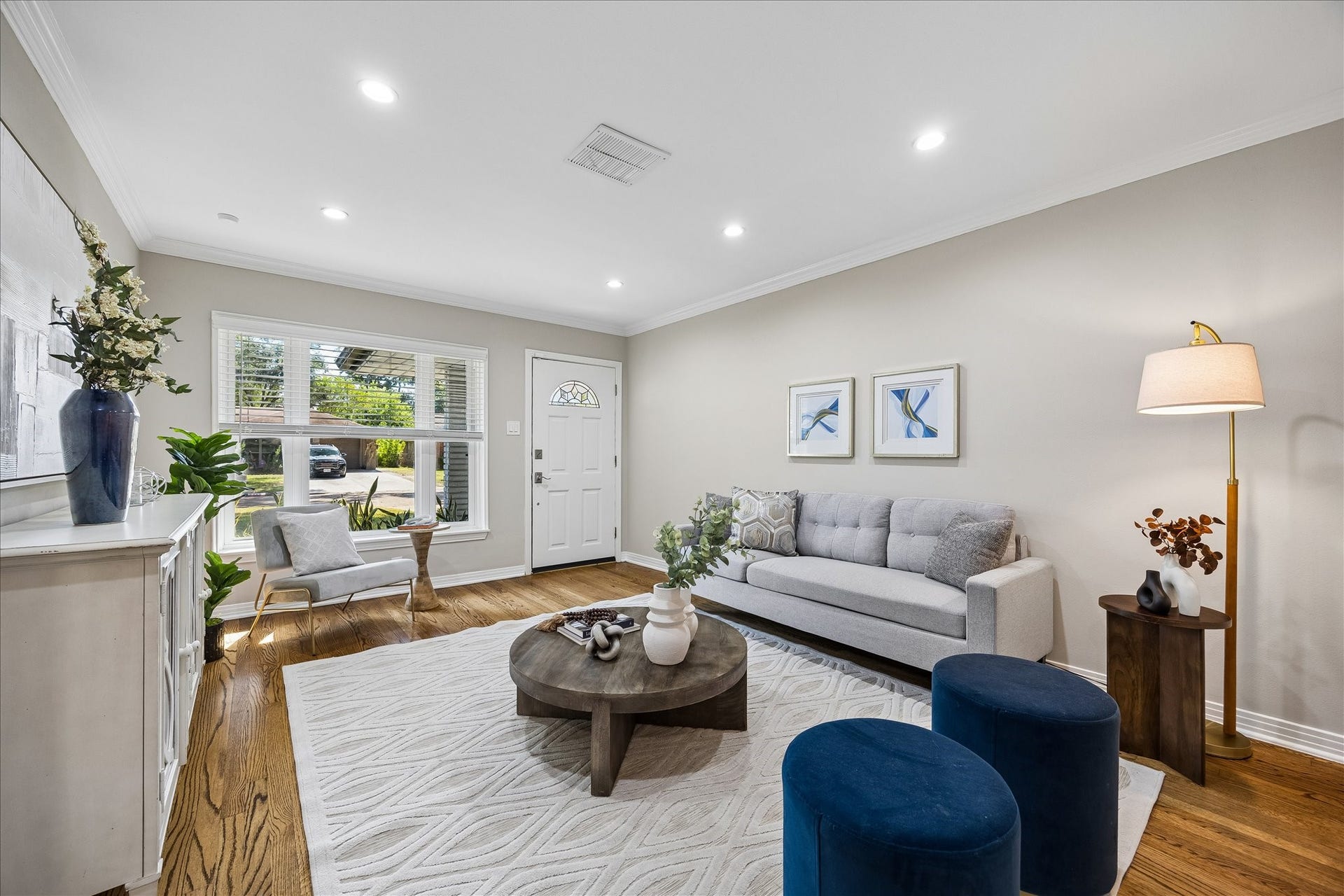 2214 Bron Holly Drive, Houston, TX 77018 Light-filled living spaces, rich hardwood floors, and refined finishes set an inviting tone.
