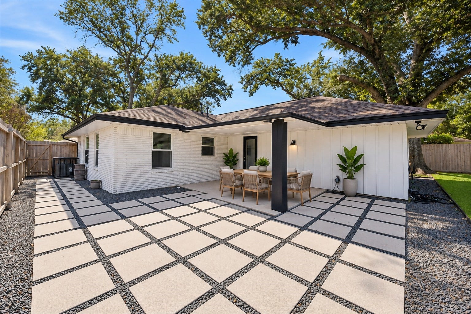 2214 Bron Holly Drive, Houston, TX 77018 An impressive outdoor setting where modern design meets relaxed backyard living.