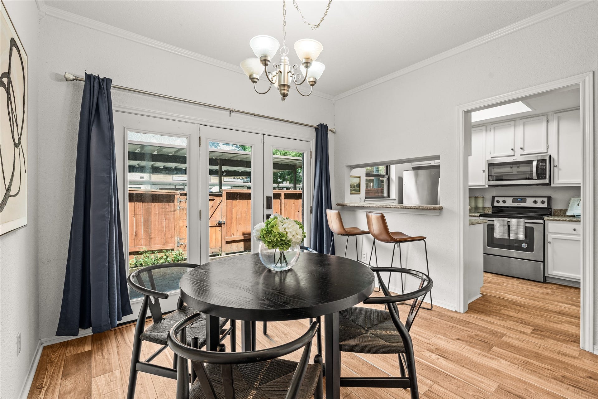 11711 Memorial Drive, #593, Houston, TX 77024 Whether you're hosting dinner or enjoying a quiet morning coffee, the dining area offers generous space with effortless access to the kitchen and patio.