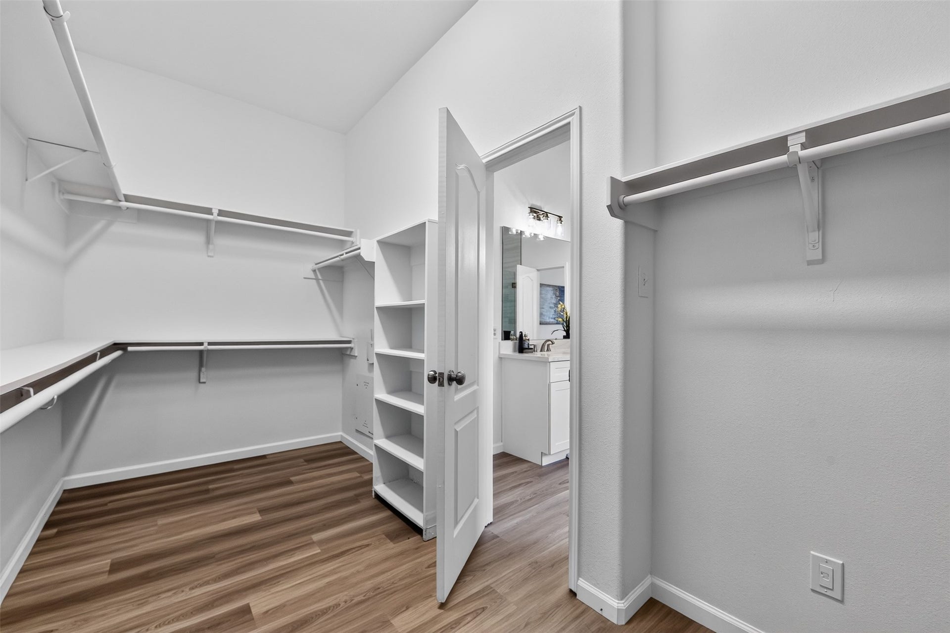 2203 Summit Pass Lane, League City, TX 77573 Wow! Look at this wonderful walk-in closet! Built-in shelving and plenty of space for hanging clothing, etc.