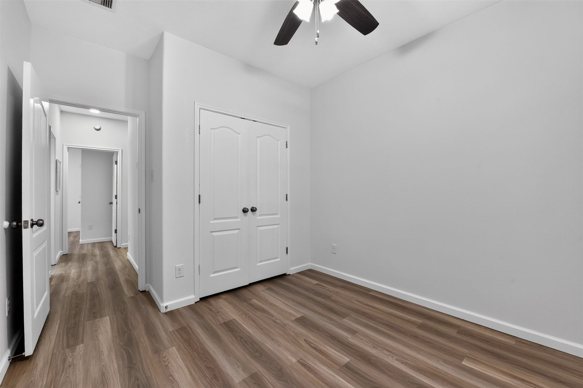 2203 Summit Pass Lane, League City, TX 77573 4th Bedroom with new flooring and ceiling fan.