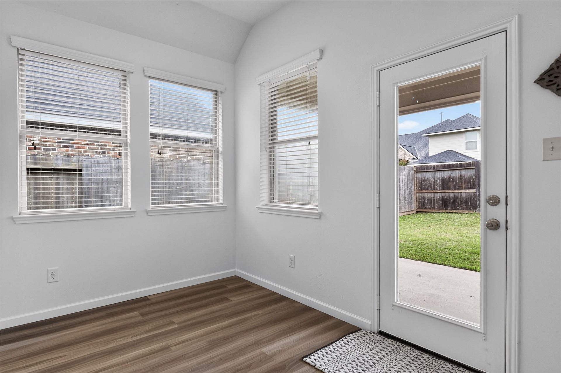 2203 Summit Pass Lane, League City, TX 77573 Breakfast area with plenty of natural light, windows have blinds, and great views of the backyard. Patio access too.