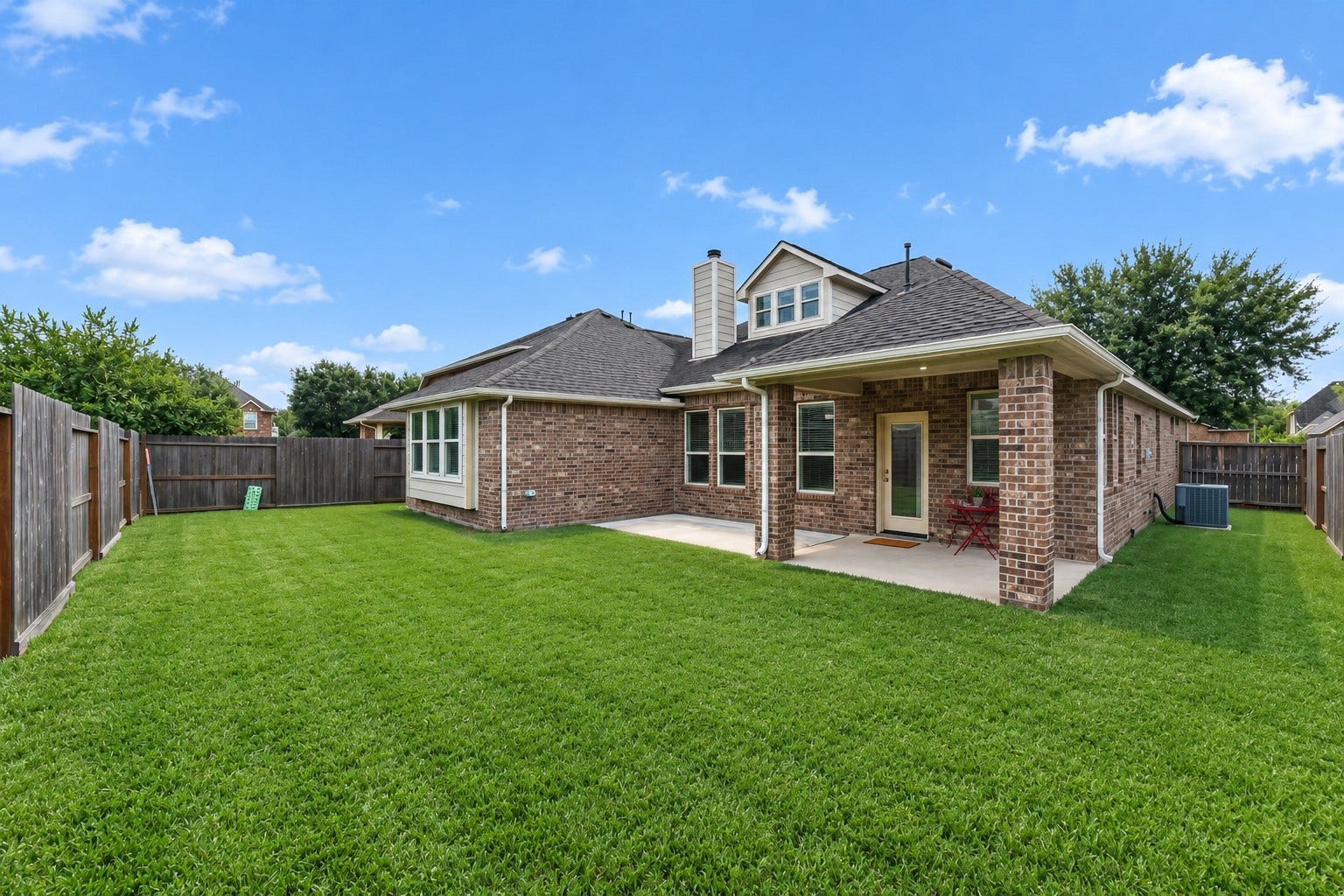 2203 Summit Pass Lane, League City, TX 77573 The big backyard is ready for all our outdoor living ideas.