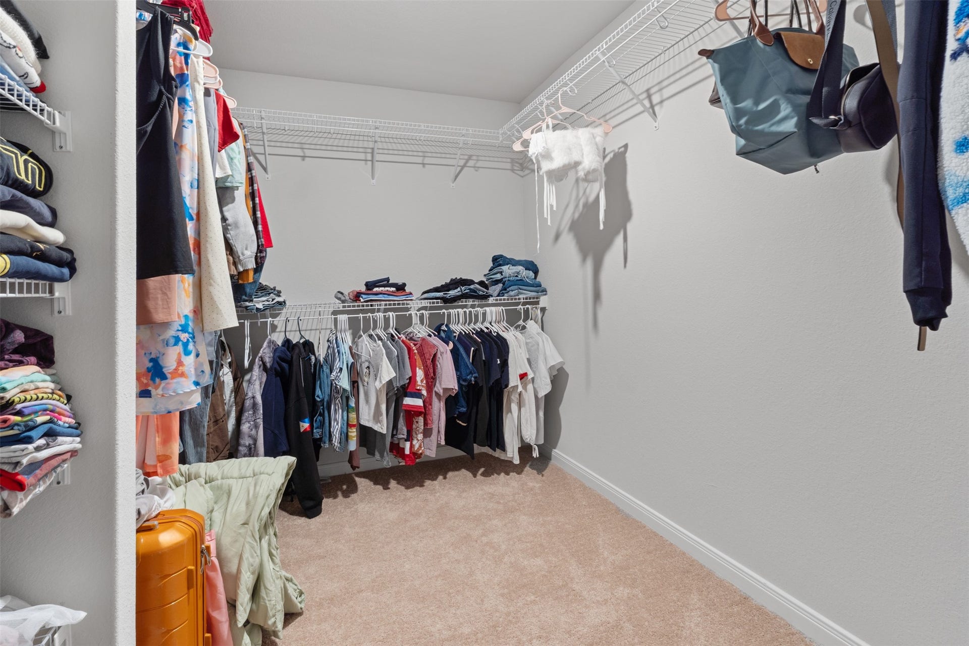 11402 Bright Sun Drive, Houston, TX 77048 Primary bedroom's walk in closet.