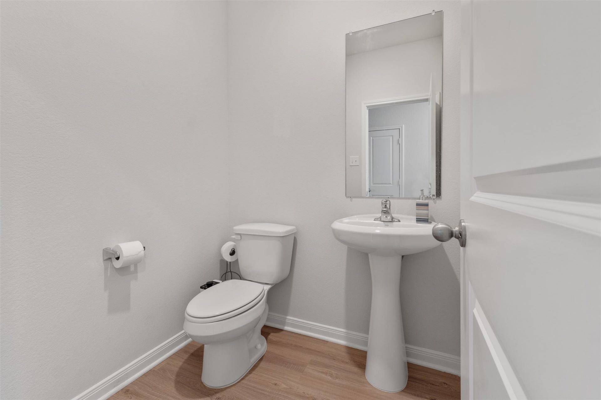 11402 Bright Sun Drive, Houston, TX 77048 Half bathroom downstairs.