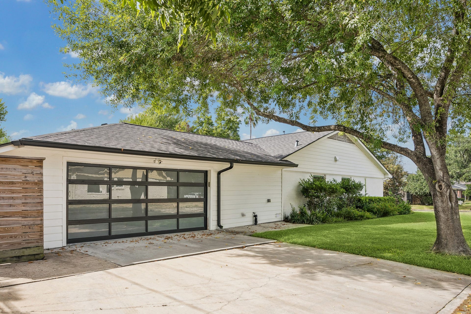 2503 Stoney Brook Drive, Houston, TX 77063 The two-car garage and extra storage space inside, offers convenient access alongside an extended driveway with extra parking. You will definitely enjoy having this corner lot with room for guests staying and large shady trees encompassing the
home.
