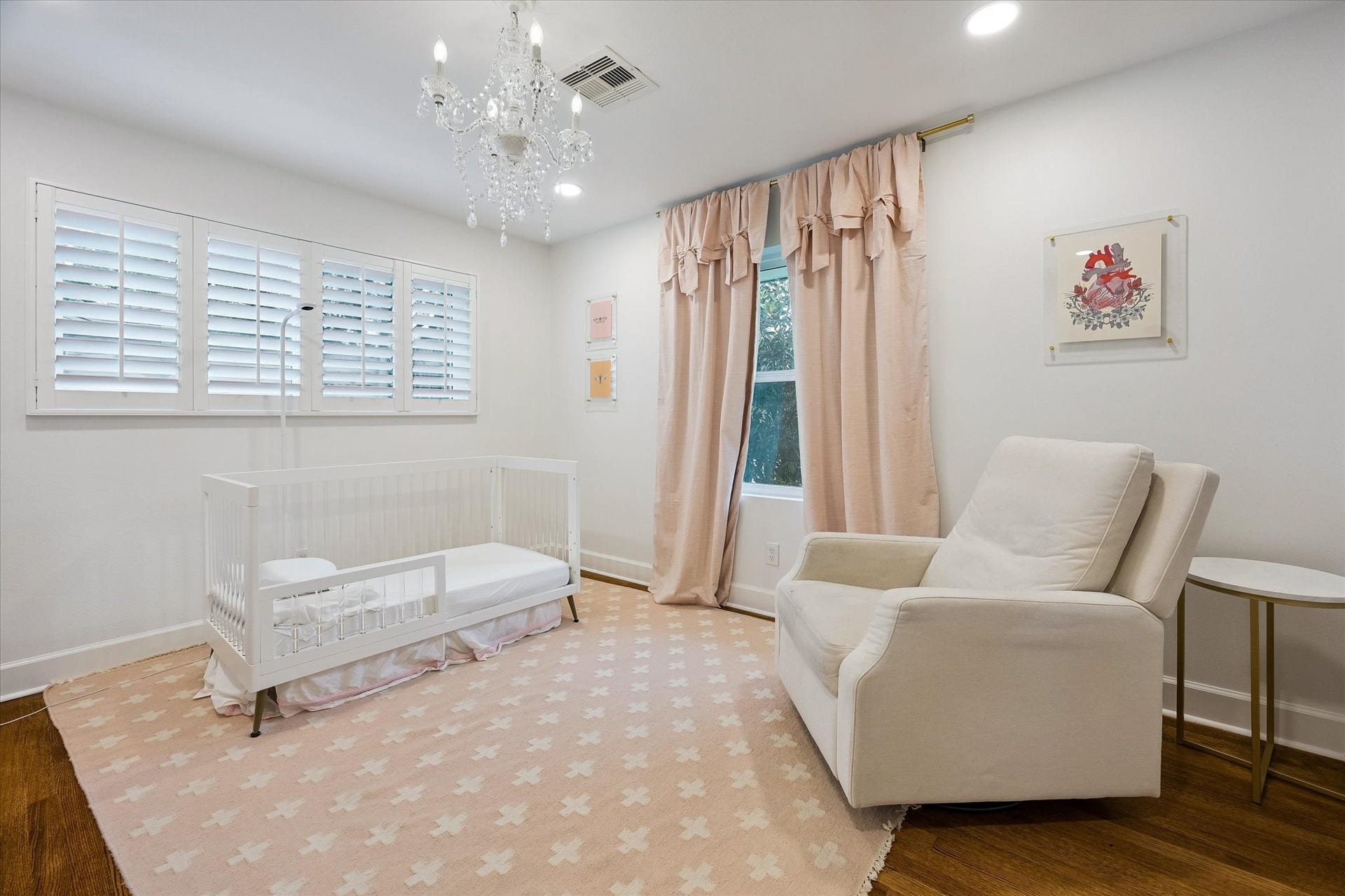 2503 Stoney Brook Drive, Houston, TX 77063 (14x11) A crystal chandelier brings an unexpected
touch of elegance to this guest bedroom, casting a
soft glow throughout the room. The thoughtfully
designed space feels every bit as refined as the
rest of the home. Draperies and rods excluded)