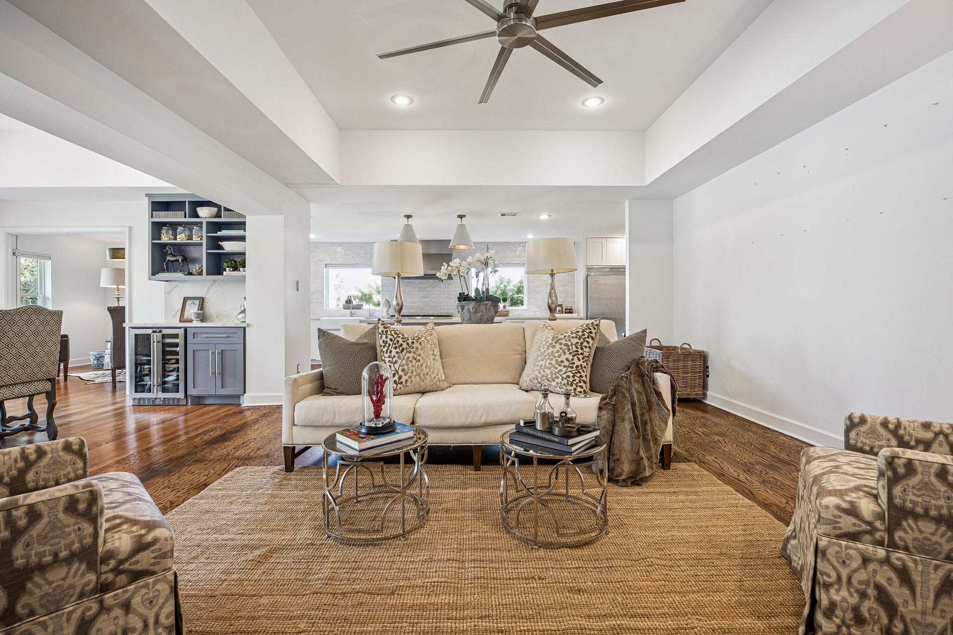 2503 Stoney Brook Drive, Houston, TX 77063 Designed for comfortable everyday living, this open-concept space offers plenty of room to gather with family and friends. Its seamless connection to the dining room and kitchen makes entertaining effortless.