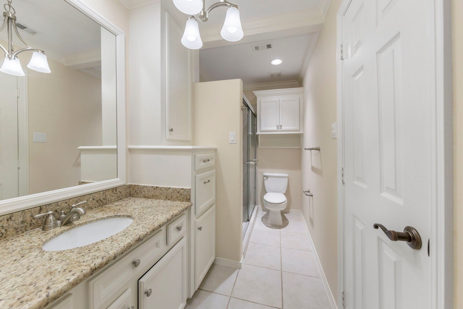 90 W Horizon Ridge Place, Spring, TX 77381 Ensuite bath boasts ample storage, granite counter tops and walk-in shower.