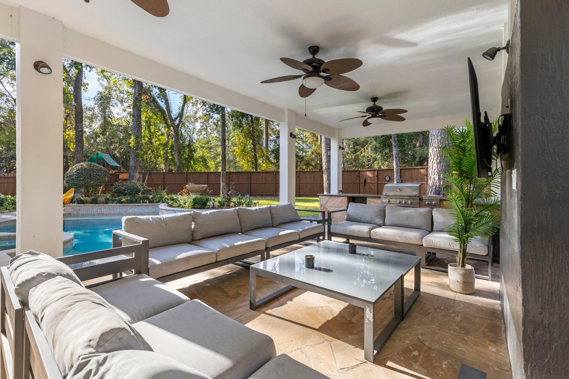 90 W Horizon Ridge Place, Spring, TX 77381 Enjoy the comforts of the extended, covered, back patio, complete with multiple fans that will keep you cool throughout the year!