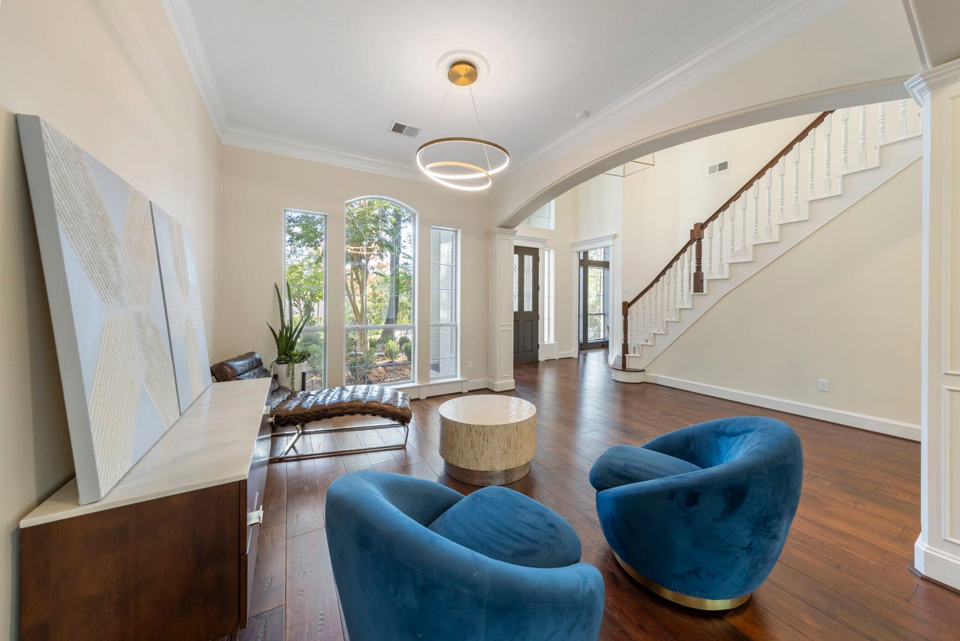 90 W Horizon Ridge Place, Spring, TX 77381 Formal dining boasts elegant crown molding with stunning views to the front of the home.