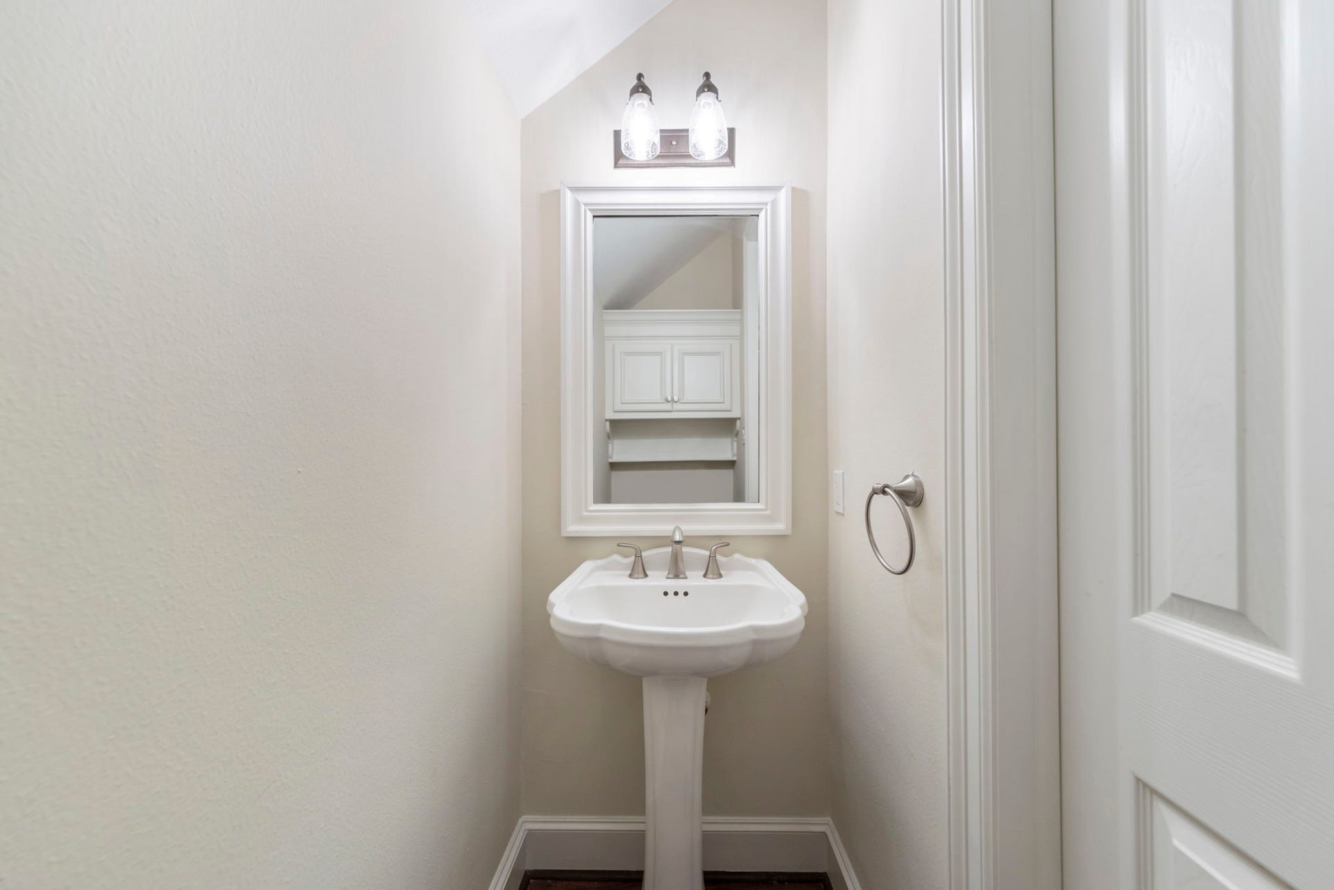 90 W Horizon Ridge Place, Spring, TX 77381 Half bath on first floor offers easy access for guests.
