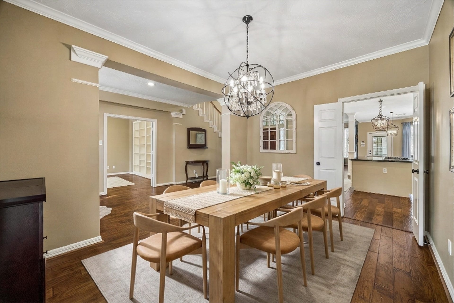 5310 Summerland Ridge Court, Houston, TX 77041 This formal dinning room features warm flooring, natural light and a beautiful chandelier.
This is a digitally staged image.