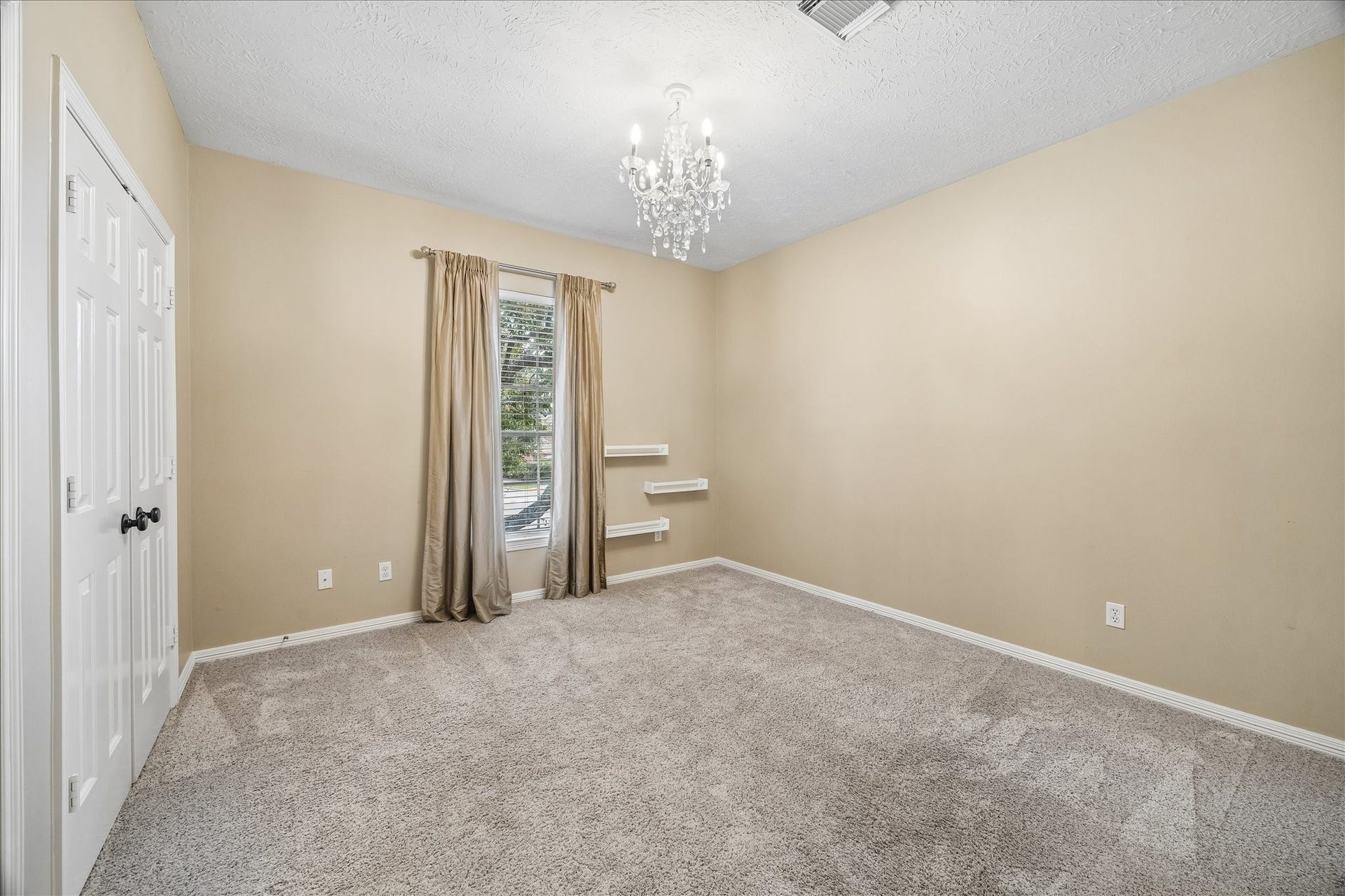 5310 Summerland Ridge Court, Houston, TX 77041 This bedroom is located on the second floor with plenty of natural light.