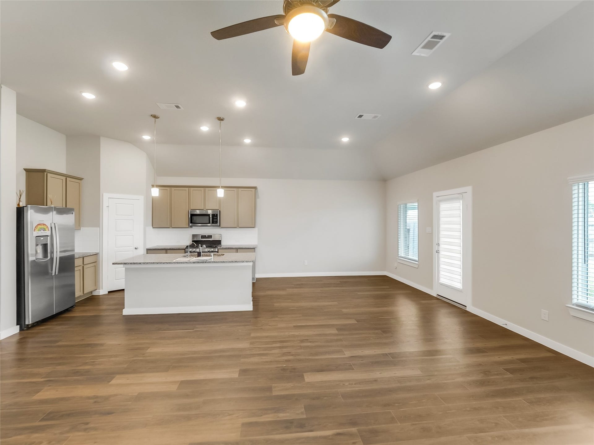 8634 Jetty Glen Drive, Cypress, TX 77433 Open Living Room to Breakfast nook and kitchen
