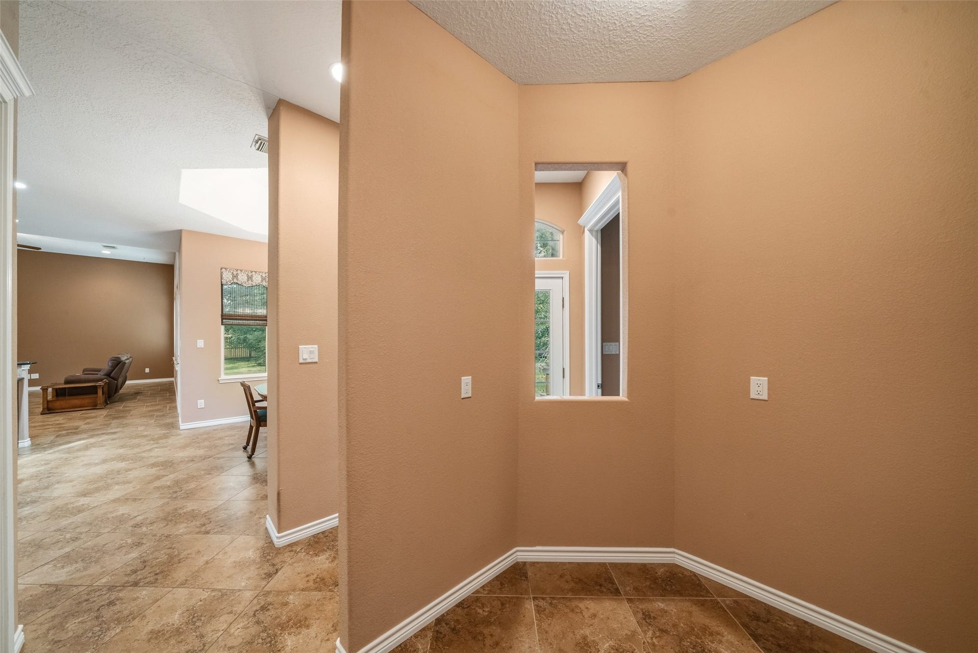 12195 N Lake Vista Drive, Willis, TX 77318 Spacious walk-in closet with ample shelving and hanging space, perfect for organized storage.