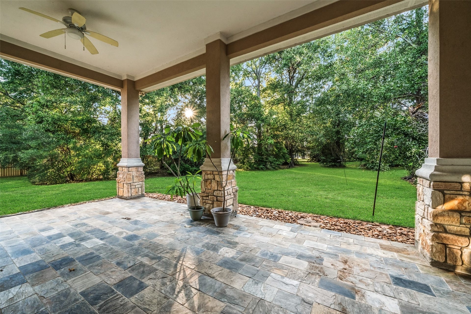 12195 N Lake Vista Drive, Willis, TX 77318 Spacious and versatile room with neutral tones, featuring arched doorways, recessed lighting, and a ceiling fan, perfect for a home office or additional living space.
