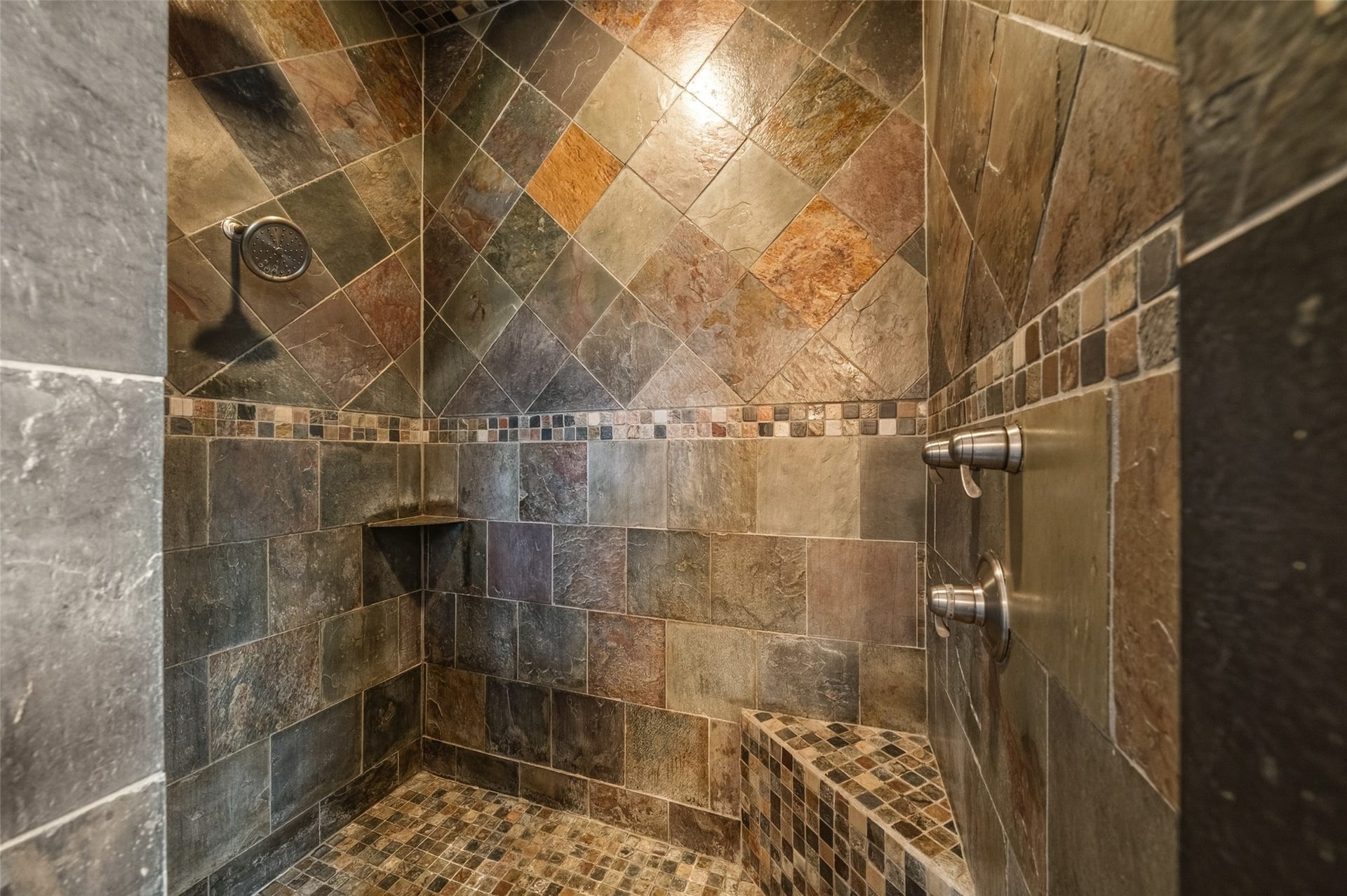12195 N Lake Vista Drive, Willis, TX 77318 Spacious kitchen with rich wooden cabinetry, sleek granite countertops, and modern stainless steel appliances, featuring a large island perfect for cooking and entertaining.