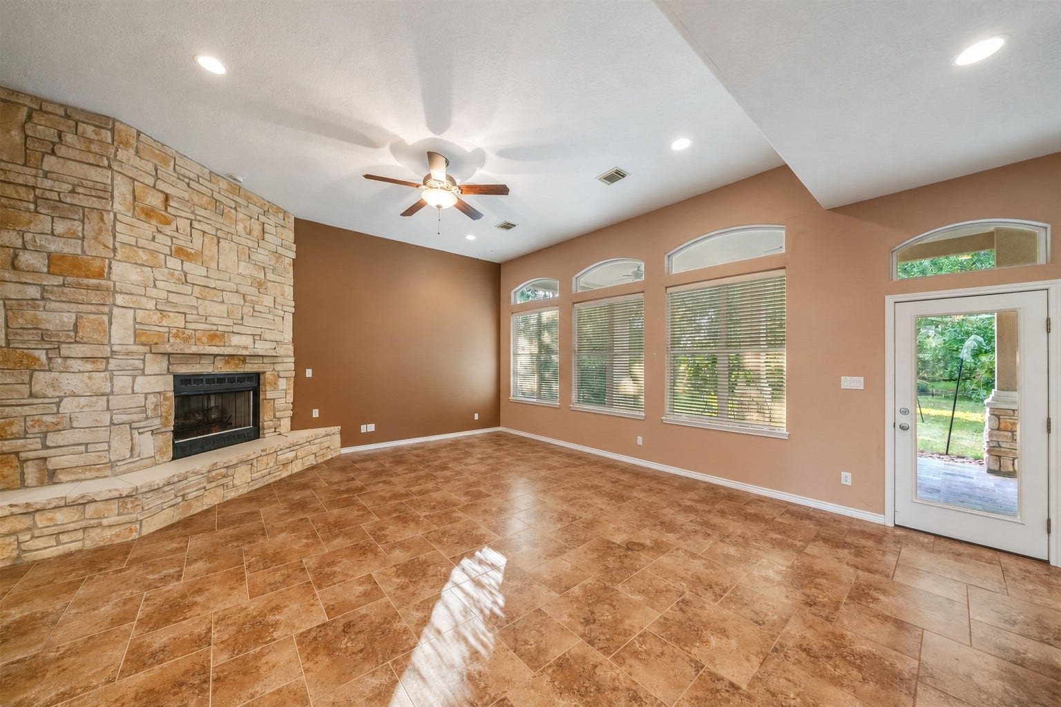 12195 N Lake Vista Drive, Willis, TX 77318 Fireplace and living room