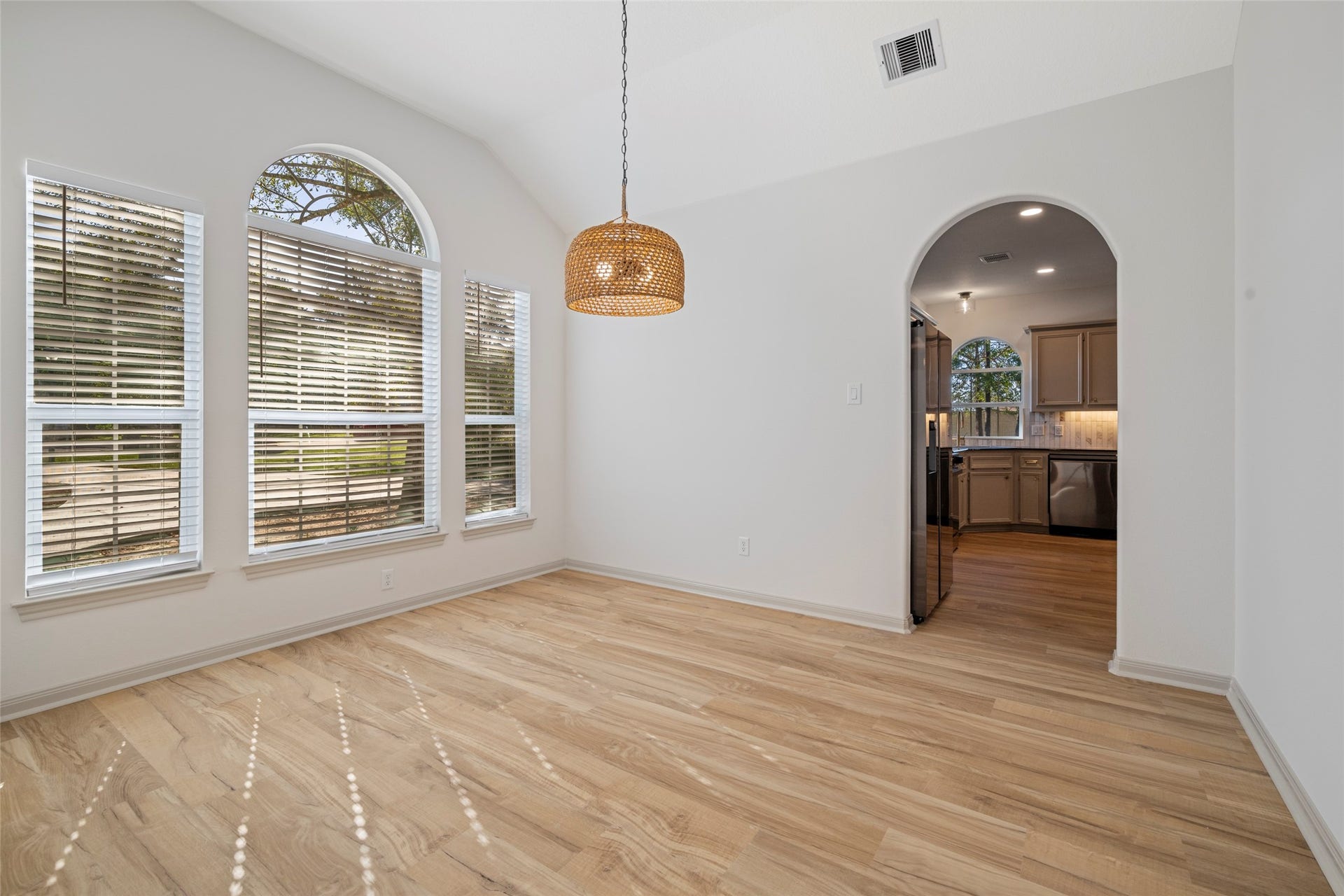 28614 Water Park Way, Spring, TX 77386 Sundrenched formal dining with entry to kitchen