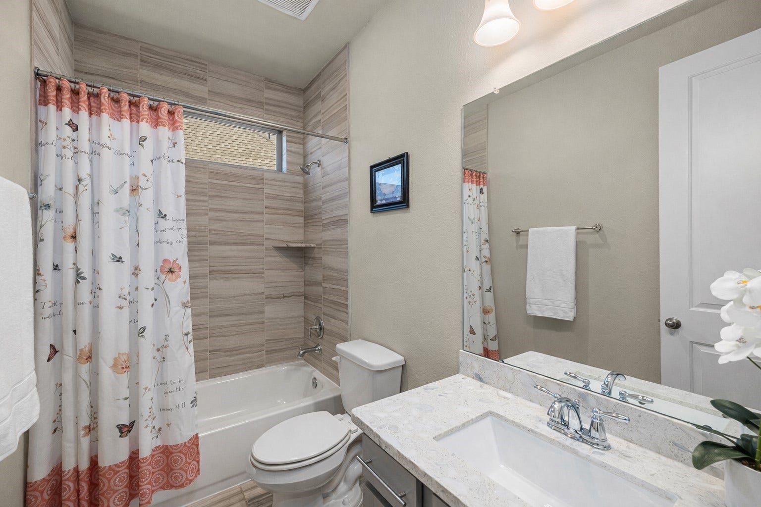Downstairs bathroom between front bedroom and flex room
