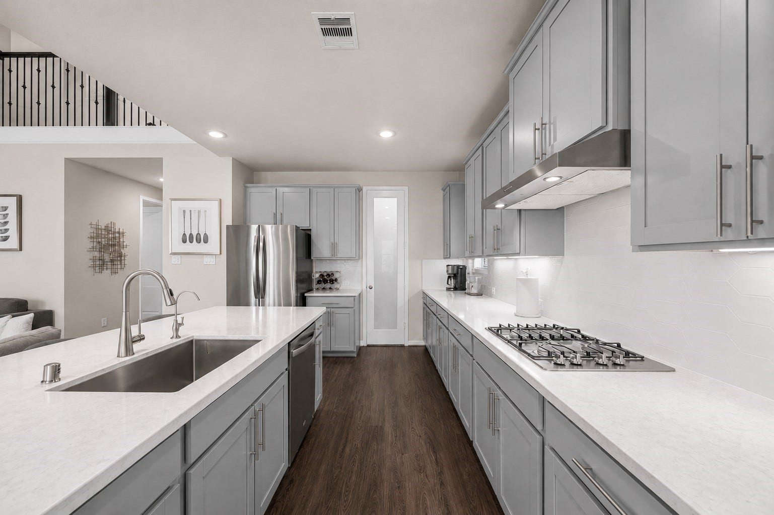 Undermount sink, gas appliances, and a large walk-in pantry