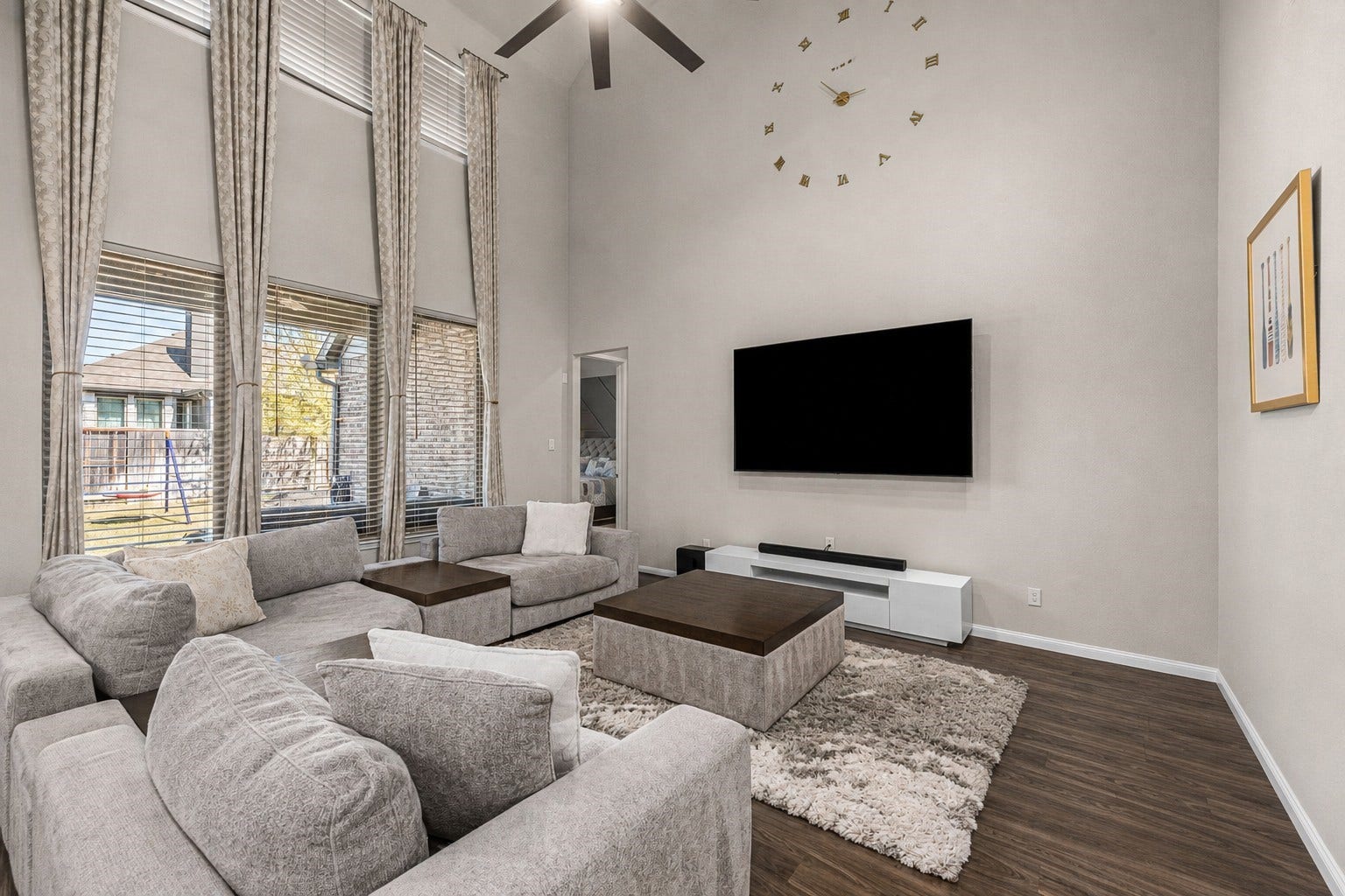Soaring ceiling with floor to ceiling windows allow and abundance of natural light in