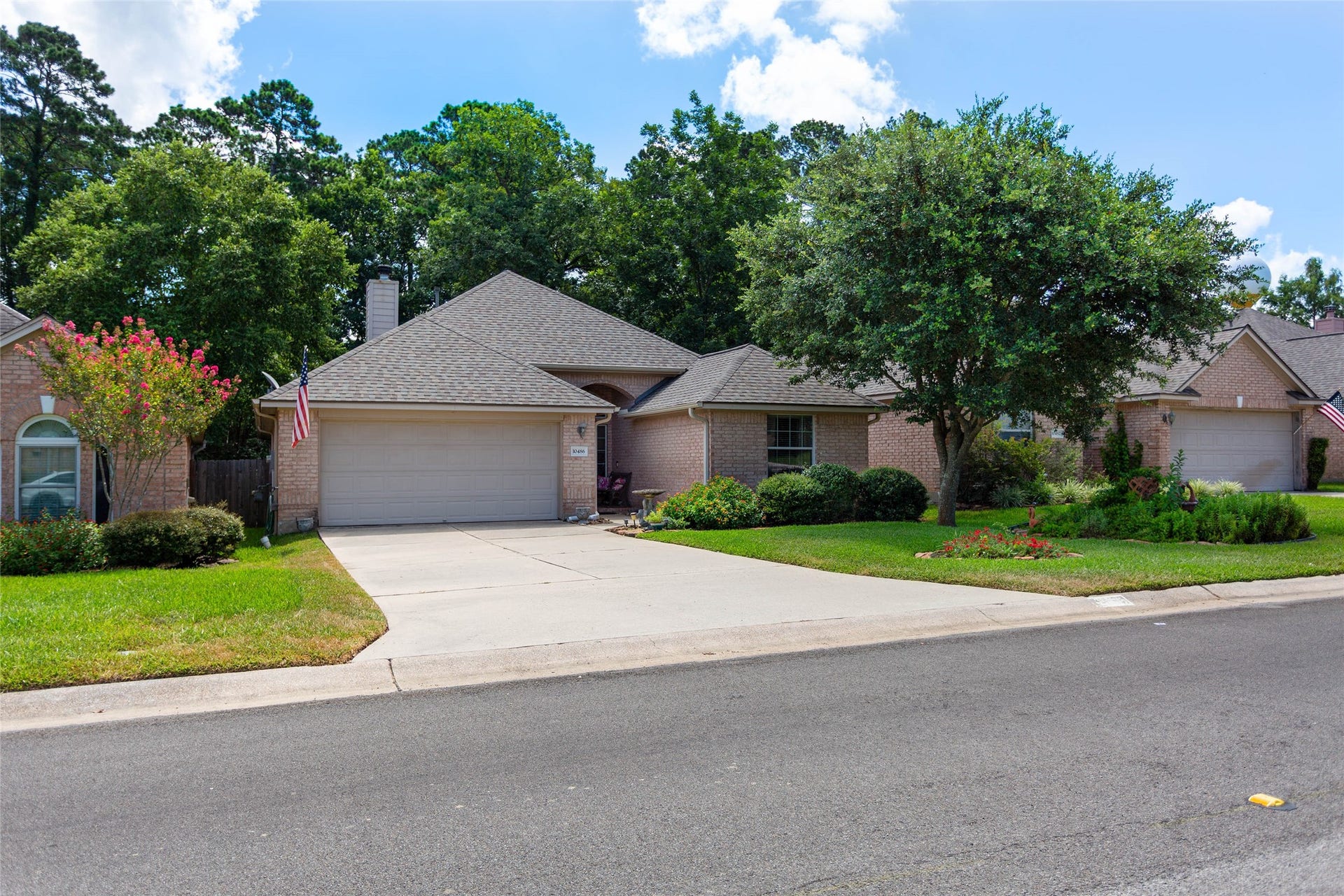 10486 Parkside Drive, Willis, TX 77318 Beautiful home, manicured front yard, so many extras here you will love it.