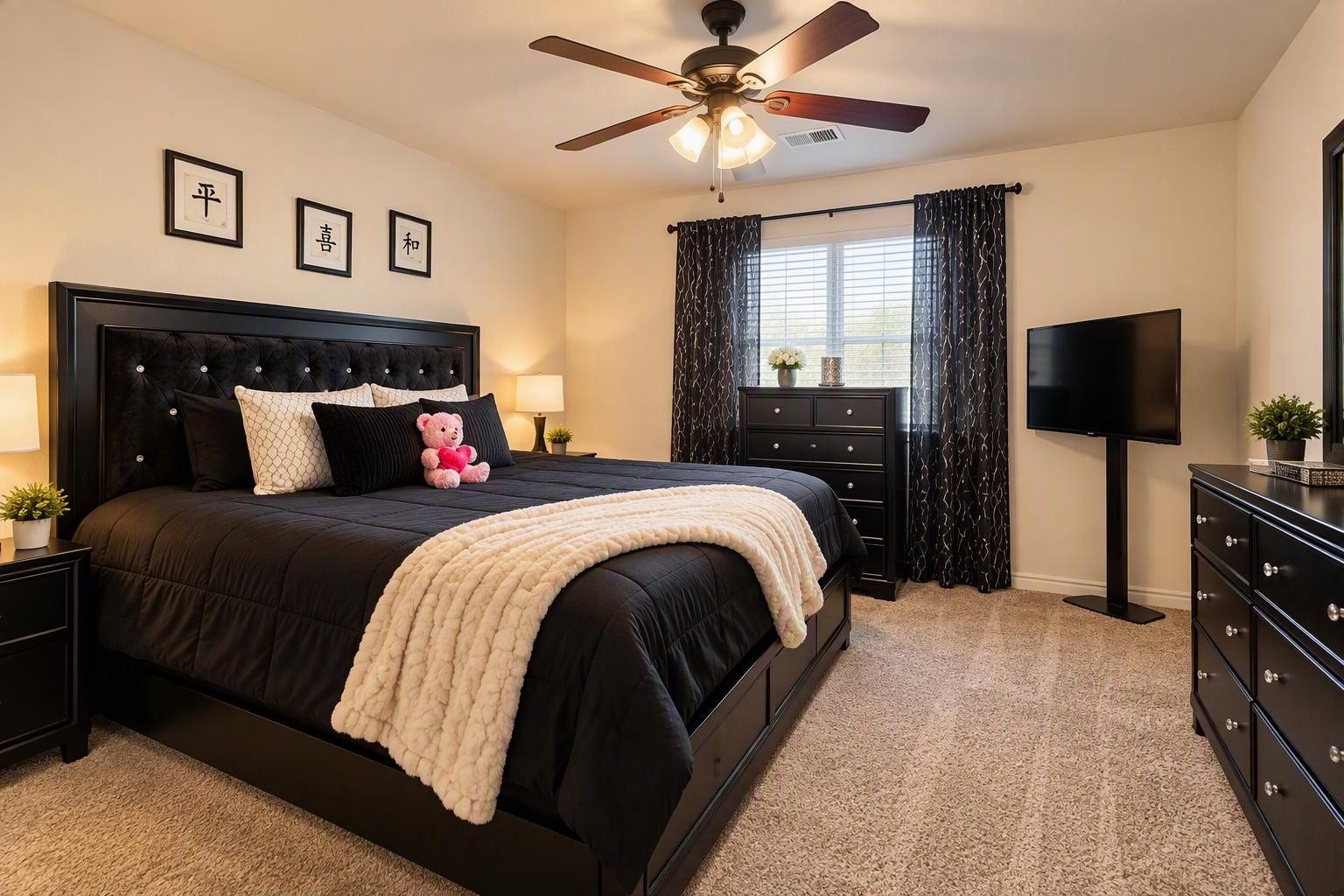 18234 Eton Ridge Court, Richmond, TX 77407 Chic bedroom featuring a plush king-sized bed with elegant black furnishings, cozy carpeting, and a ceiling fan for comfort.