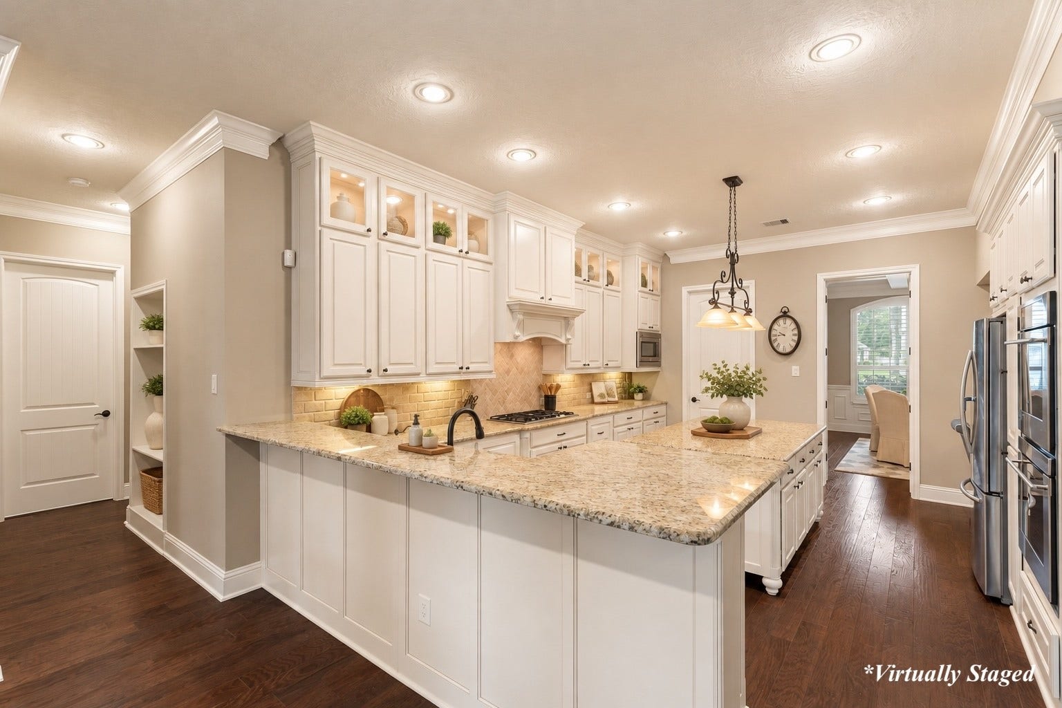 27015 Hidden Grove Landing Drive, Spring, TX 77386 Chef's Kitchen featuring extensive cabinetry to the ceiling, granite countertops, under-cabinet lighting, a large center island, and decorative lighted upper display cabinets. *Virtually Staged decor accents