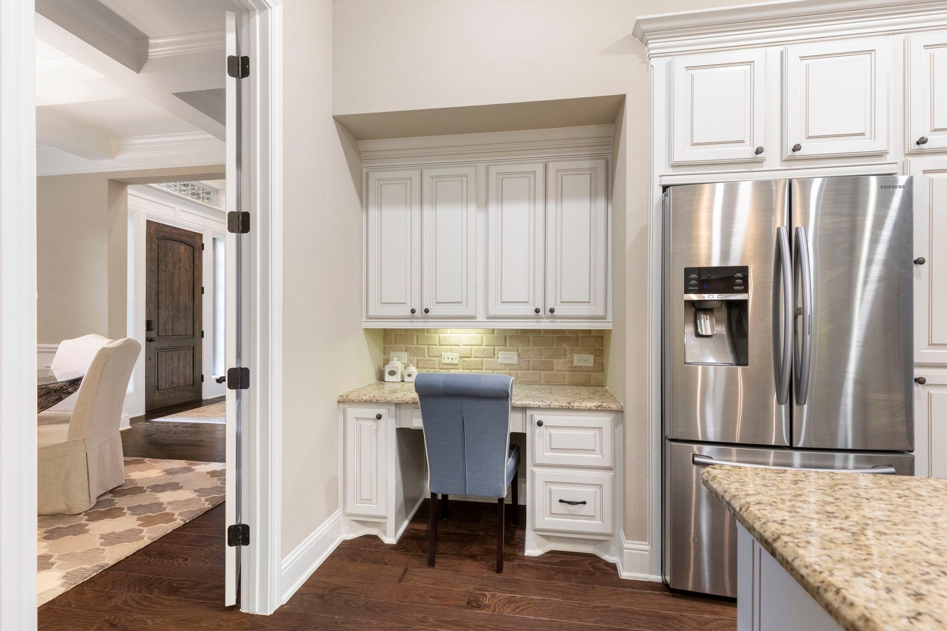 27015 Hidden Grove Landing Drive, Spring, TX 77386 Thoughtfully designed with a built-in workstation, abundant storage, and generous workspace throughout.