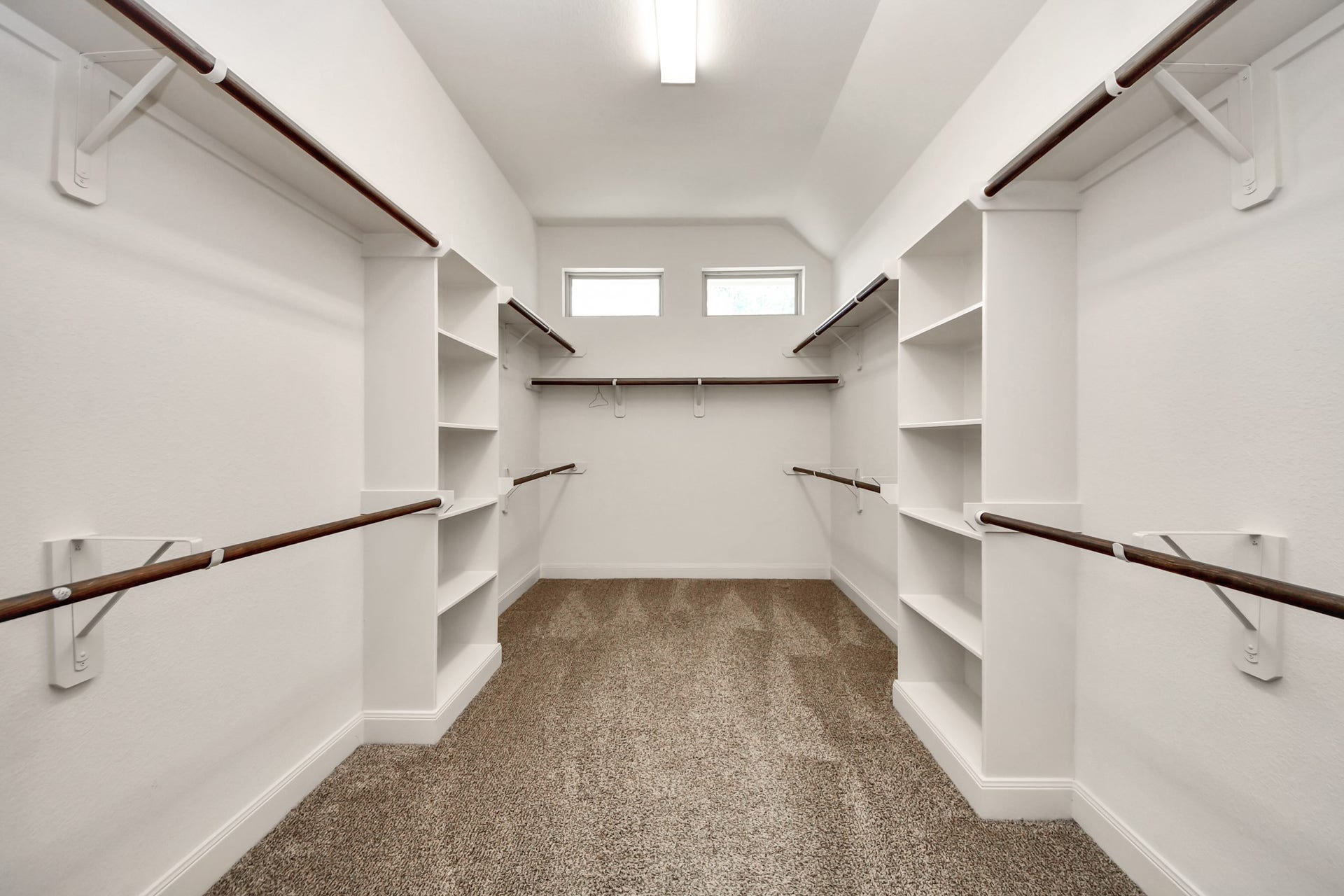 17307 Pentland Court, Richmond, TX 77407 The primary closet offers abundant storage with ample room for clothing and accessories for every season.