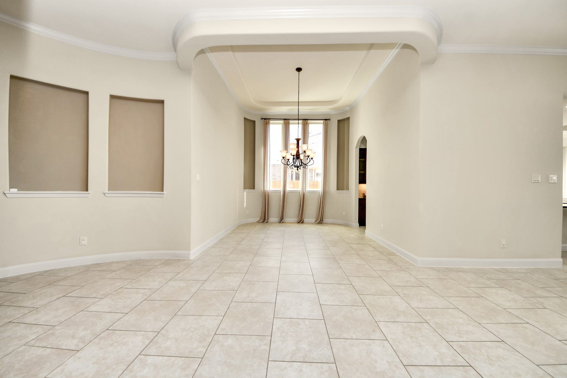 17307 Pentland Court, Richmond, TX 77407 View of the dining room from the office doors highlights the homes spacious, open-concept layout.