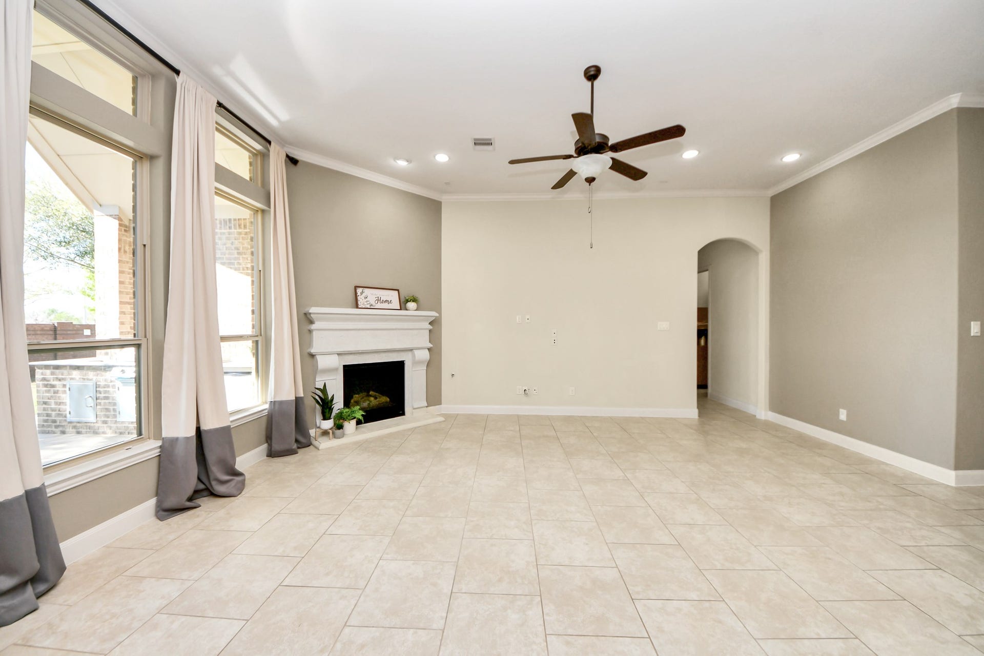 17307 Pentland Court, Richmond, TX 77407 The open-concept living room invites effortless living, allowing the home chef to stay connected with family and friends.
