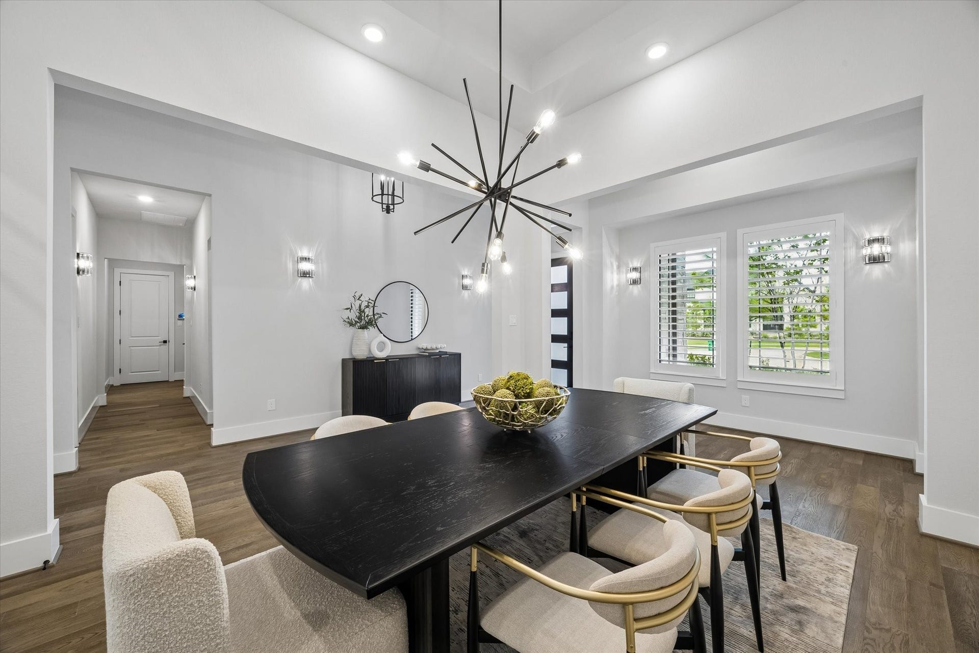 27720 Hazelbrook Lane, Spring, TX 77386 Recessed Lighting & high-end Modern Light Fixture in your Dining Room. Notice the Plantation Shutters throughout this luxury home