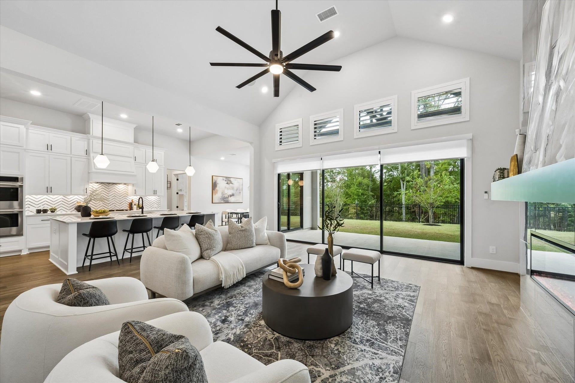 27720 Hazelbrook Lane, Spring, TX 77386 Another view of your Living Room looking out at the picturesque nature views. Your sliding glass doors lead to a 19'x11' (approx) Covered Patio with upgraded ceiling fan