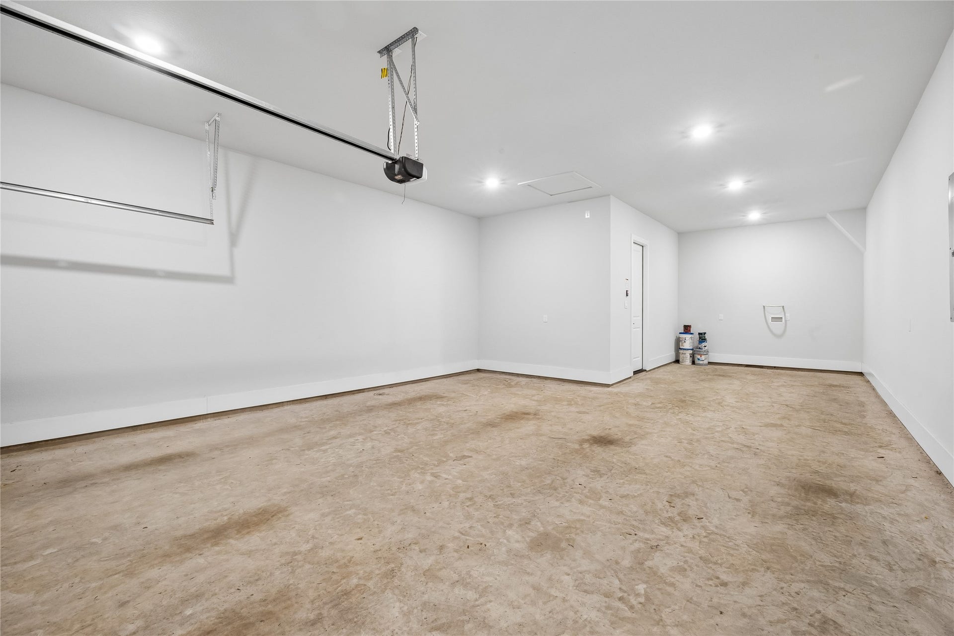 27720 Hazelbrook Lane, Spring, TX 77386 THREE Car Garage with tons of space and recessed lighting