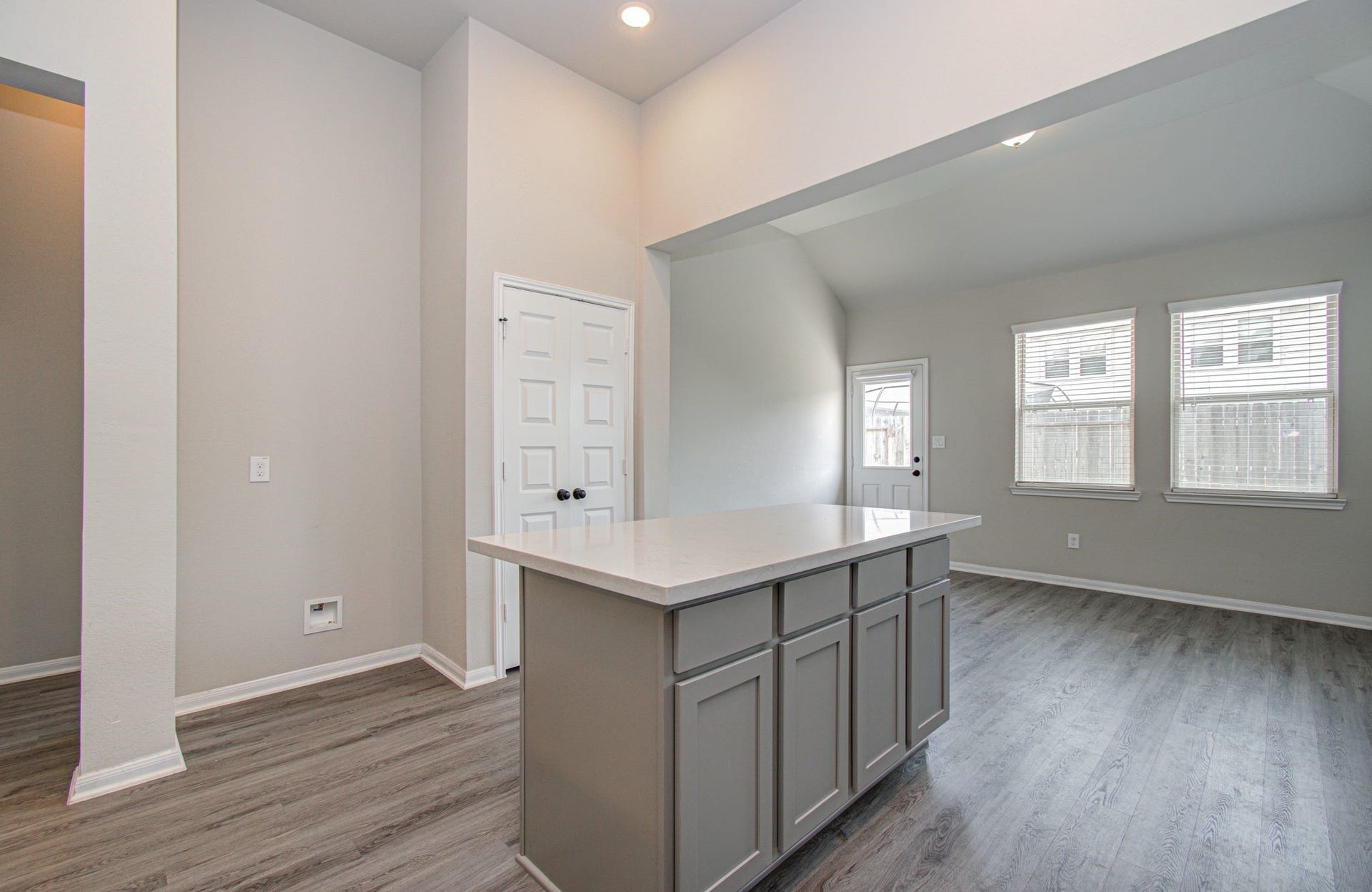 Kitchen has a large functional island with additional cabinetry storage underneath