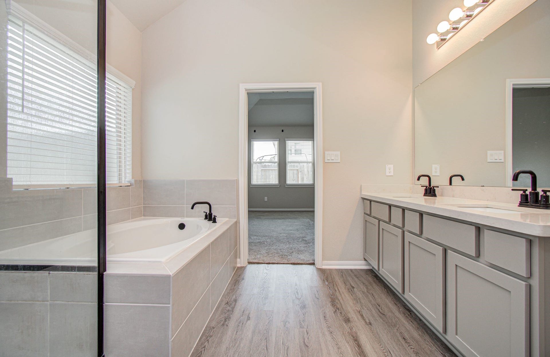 Luxurious well sized primary bath.