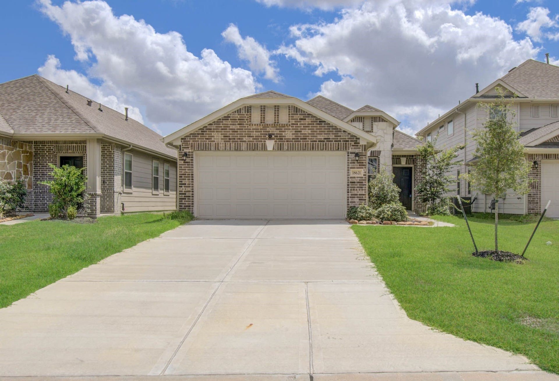 Front elevation, stunning clay brick that will give brilliance & vibrance . Also very functional extended driveway