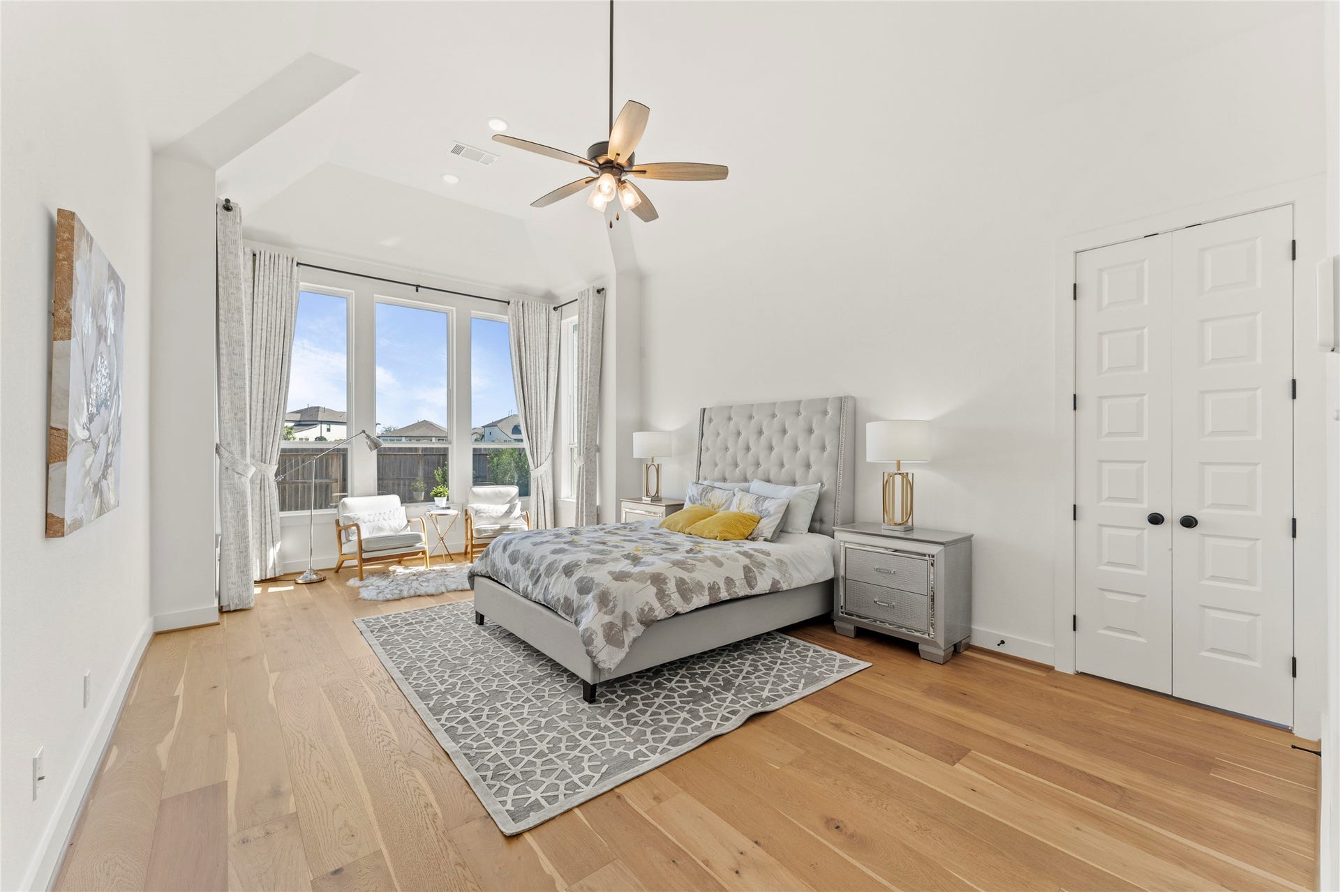 1934 Pleasant Grove Drive, Missouri City, TX 77459 Escape to this incredibly spacious primary retreat, complete with high ceilings, warm wood flooring, and a dedicated seating area!