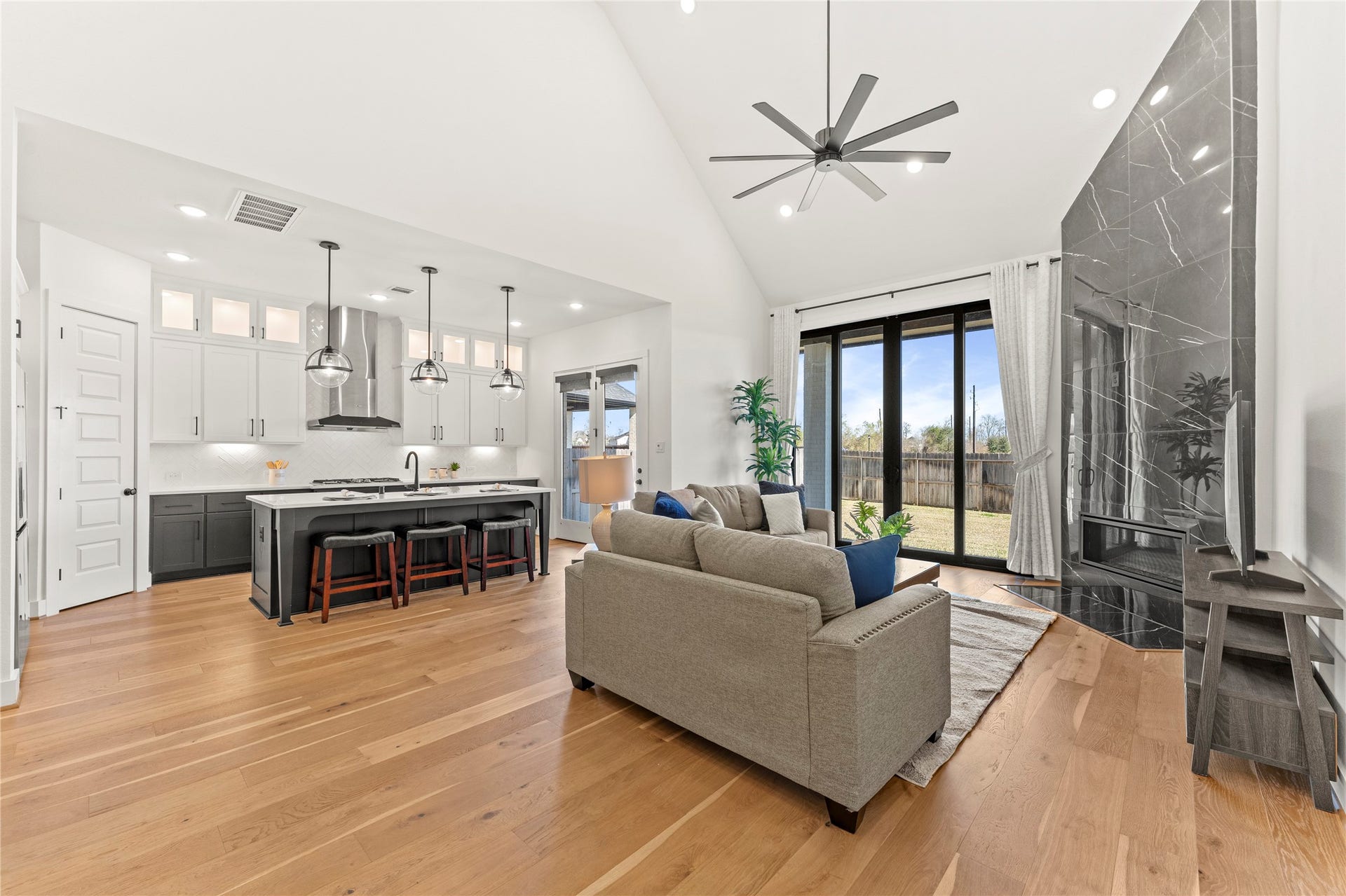 1934 Pleasant Grove Drive, Missouri City, TX 77459 The open-concept design ensures you never miss a moment of the action whether you are lounging by the fire or hosting a crowd!